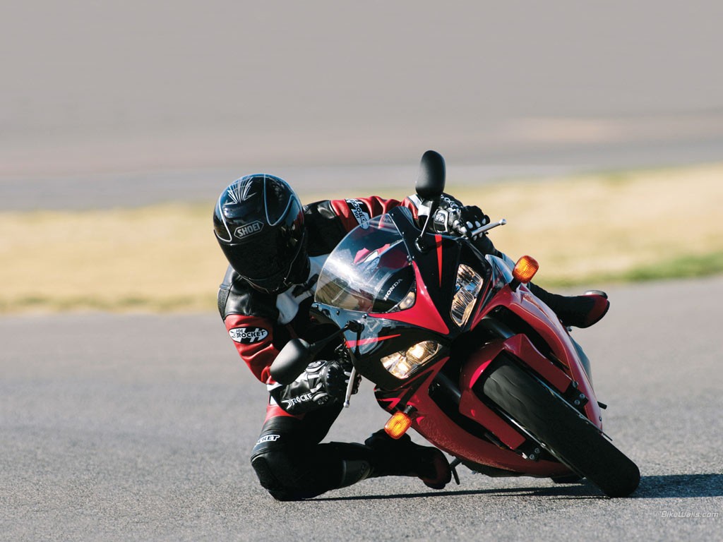 General 1024x768 Honda motorcycle vehicle racing motorsport asphalt Red Motorcycles Japanese motorcycles