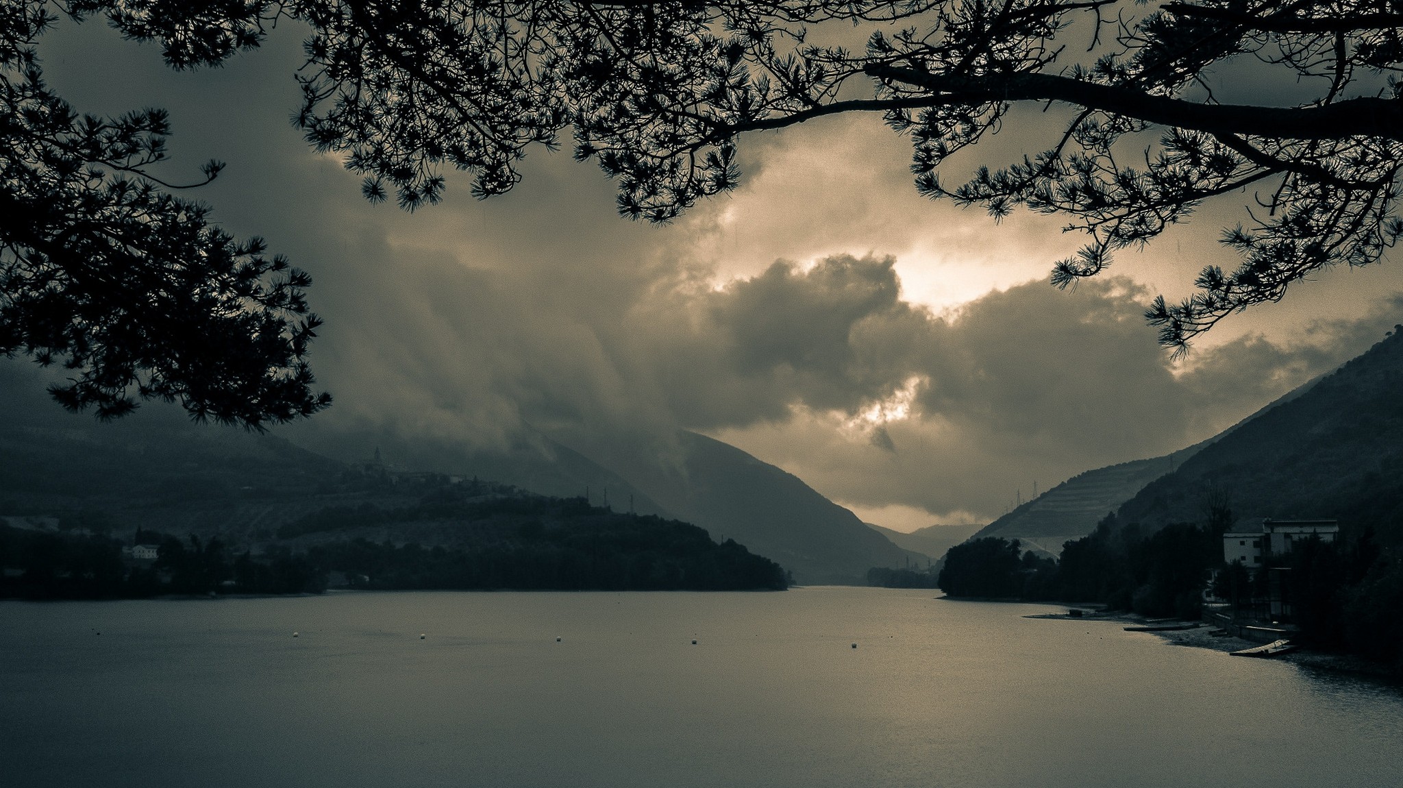 General 2048x1150 landscape nature lake mountains dark clouds trees daylight building Italy far view