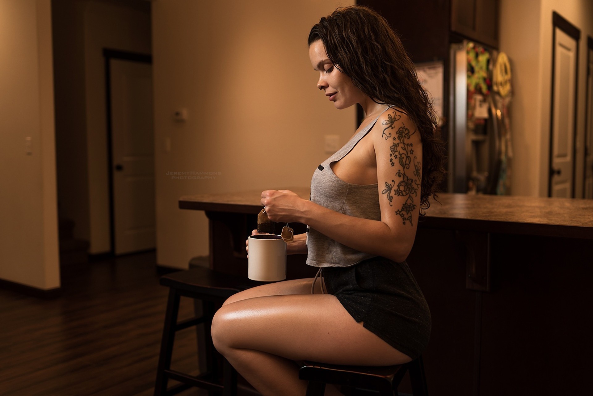People 1920x1282 women portrait shorts tanned T-shirt cup tea sitting tattoo nose ring sideboob Jeremy Hammons