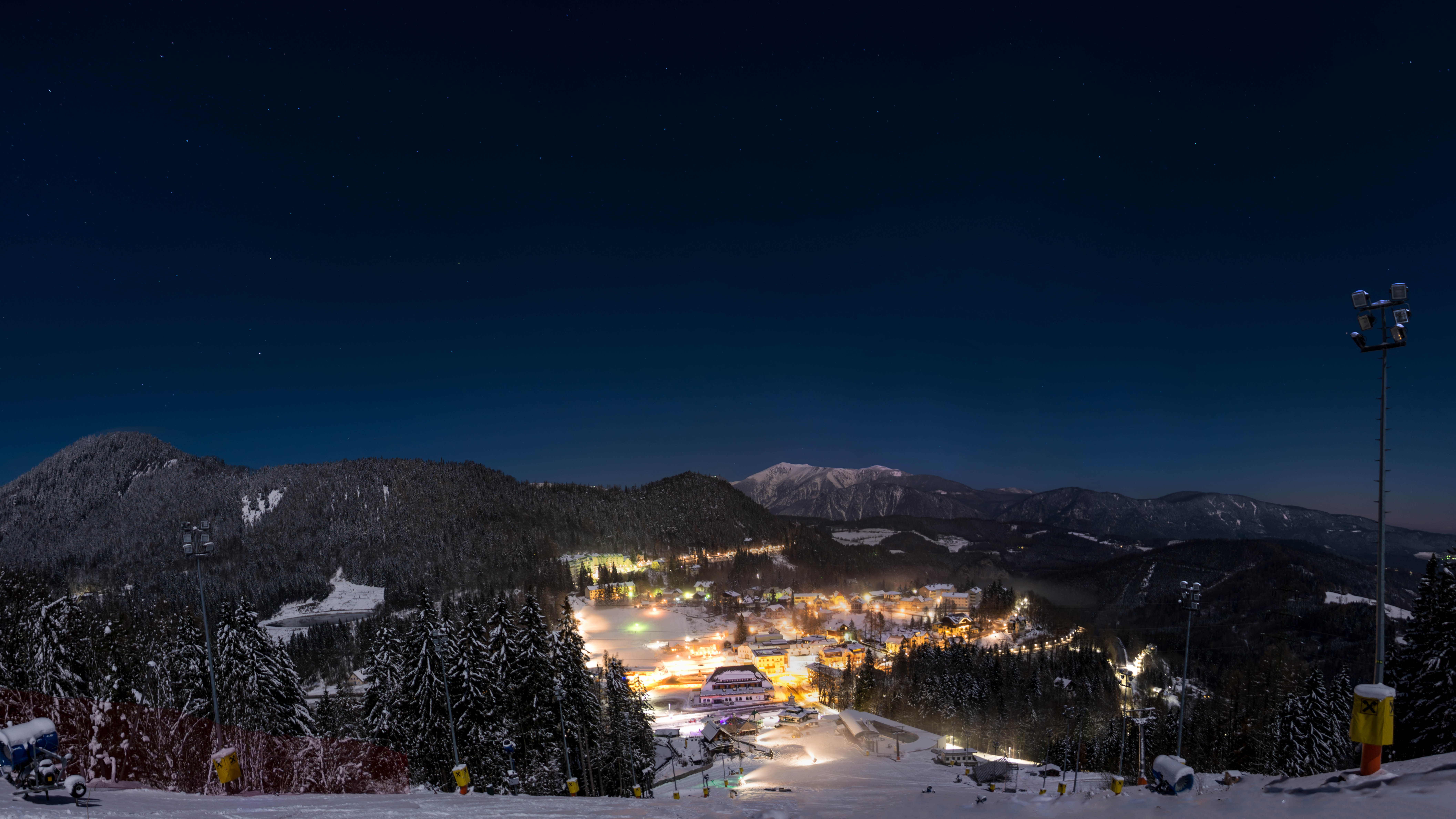 General 8452x4754 night stars sky winter snow lights low light ski resort mountains