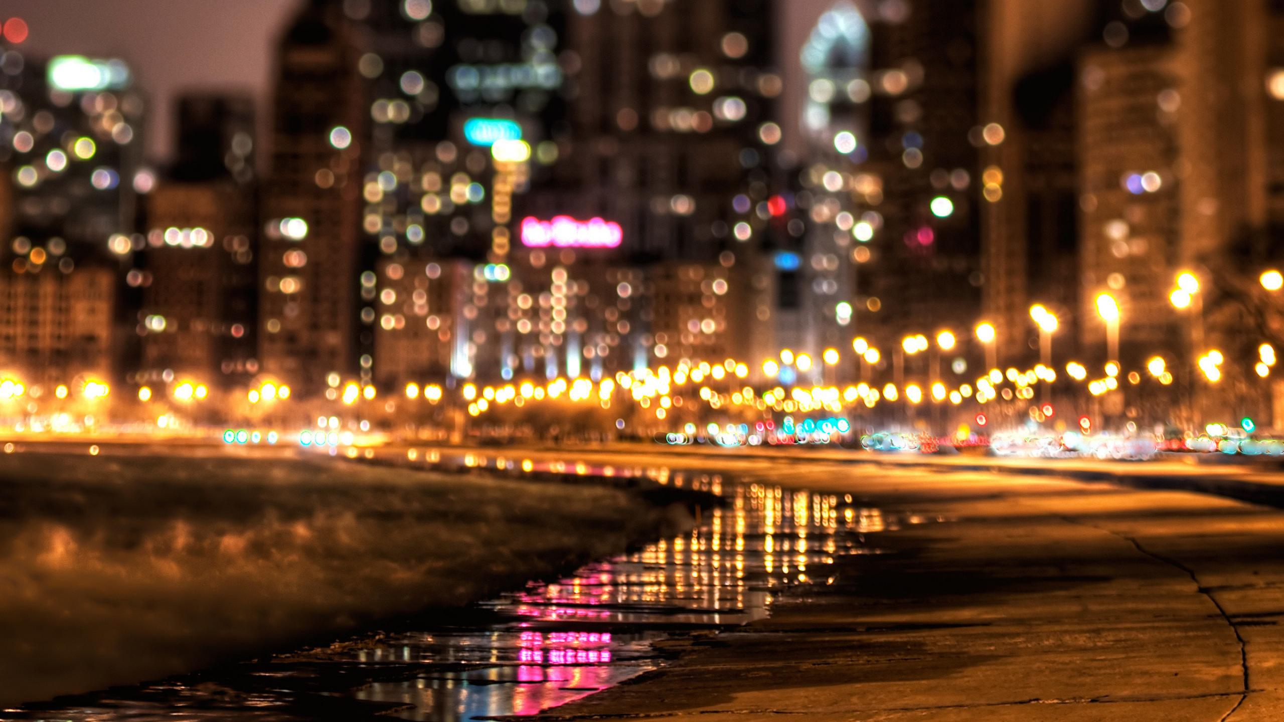 General 2560x1440 cityscape lights city night bokeh reflection building water street light blurred blurry background city lights