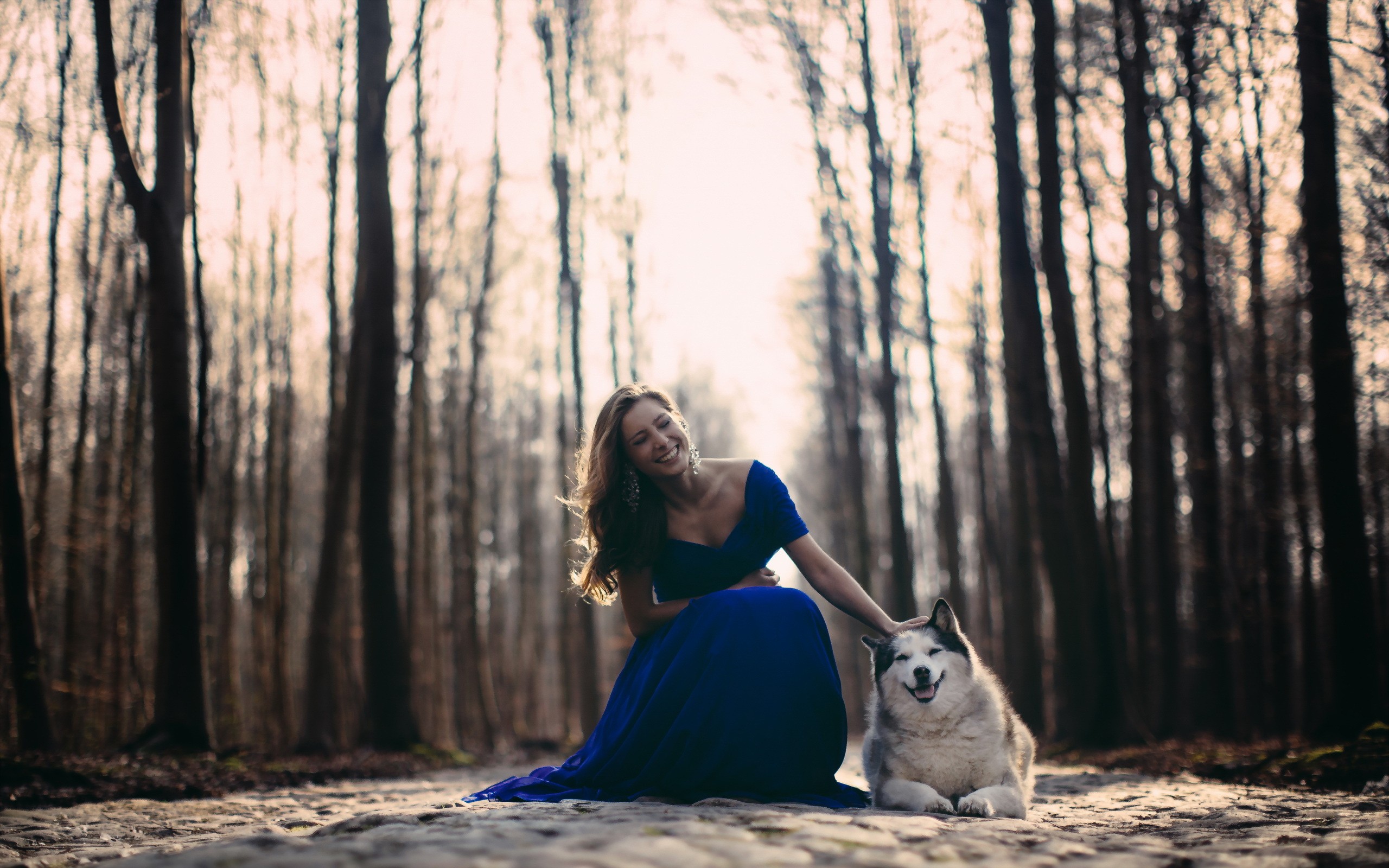 People 2560x1600 women Siberian Husky  blue dress snow smiling women with dogs dog mammals blue clothing dress model