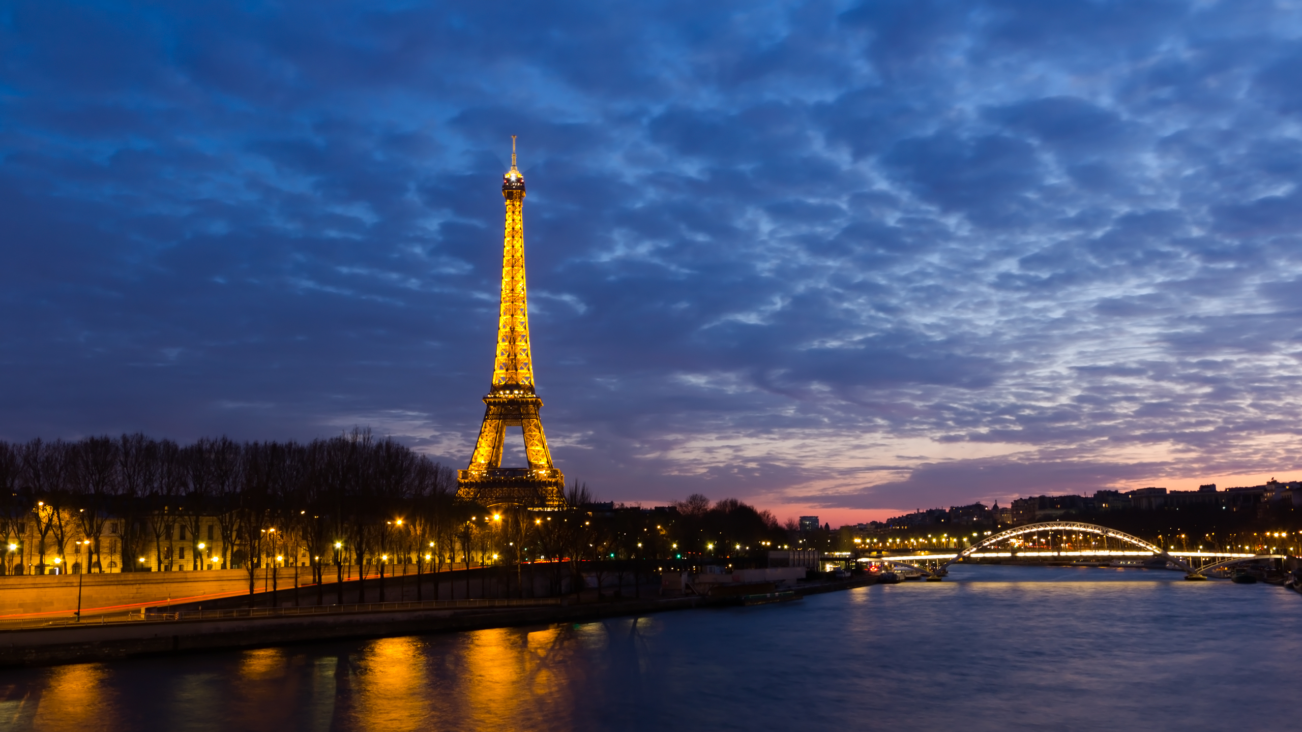 General 2560x1440 Paris clouds lights cityscape Eiffel Tower France evening landmark Europe low light