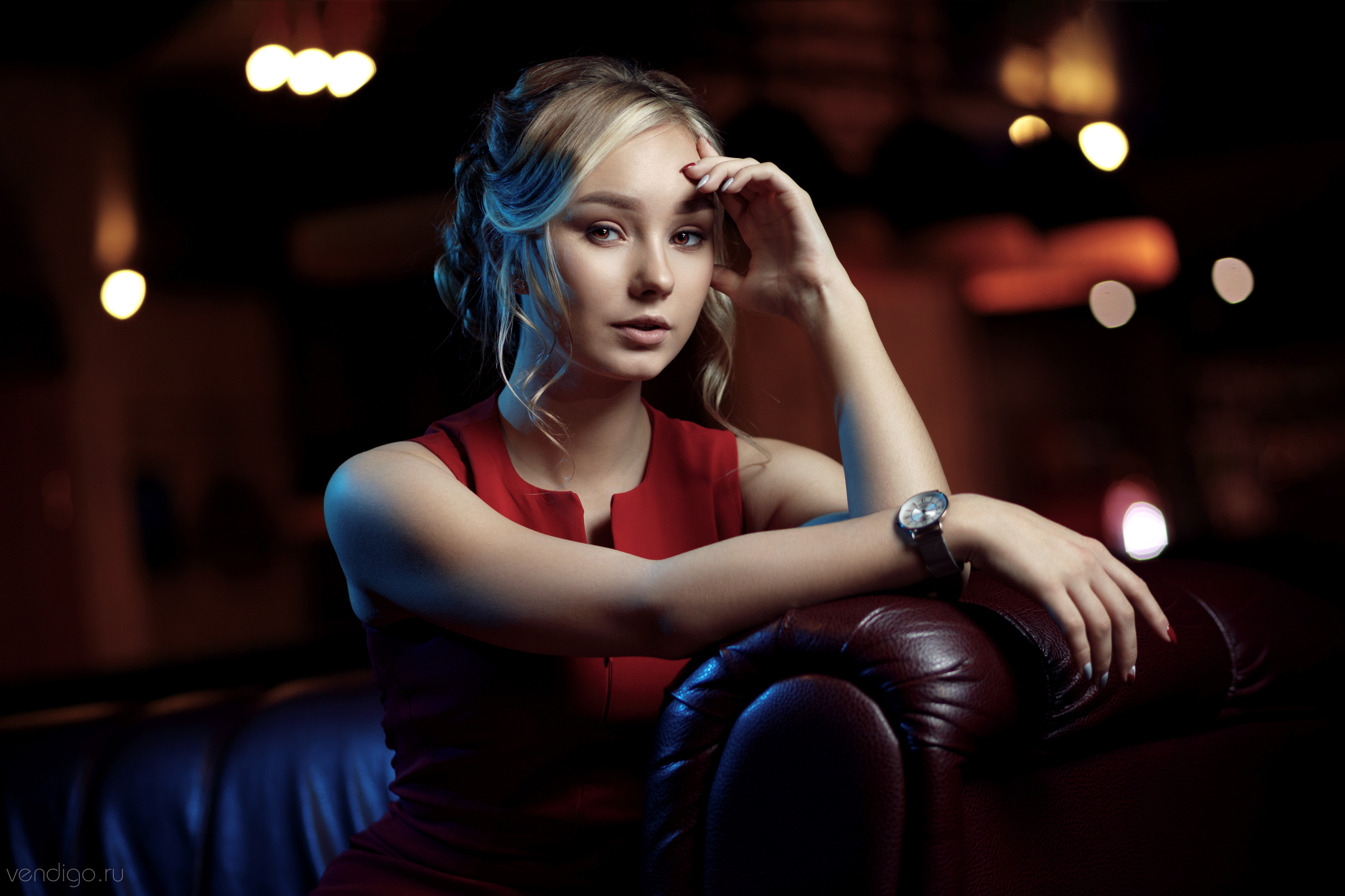 People 6720x4480 women model portrait blonde brown eyes looking at viewer hand on face red dress sitting leather couch Evgeniy Bulatov Milena
