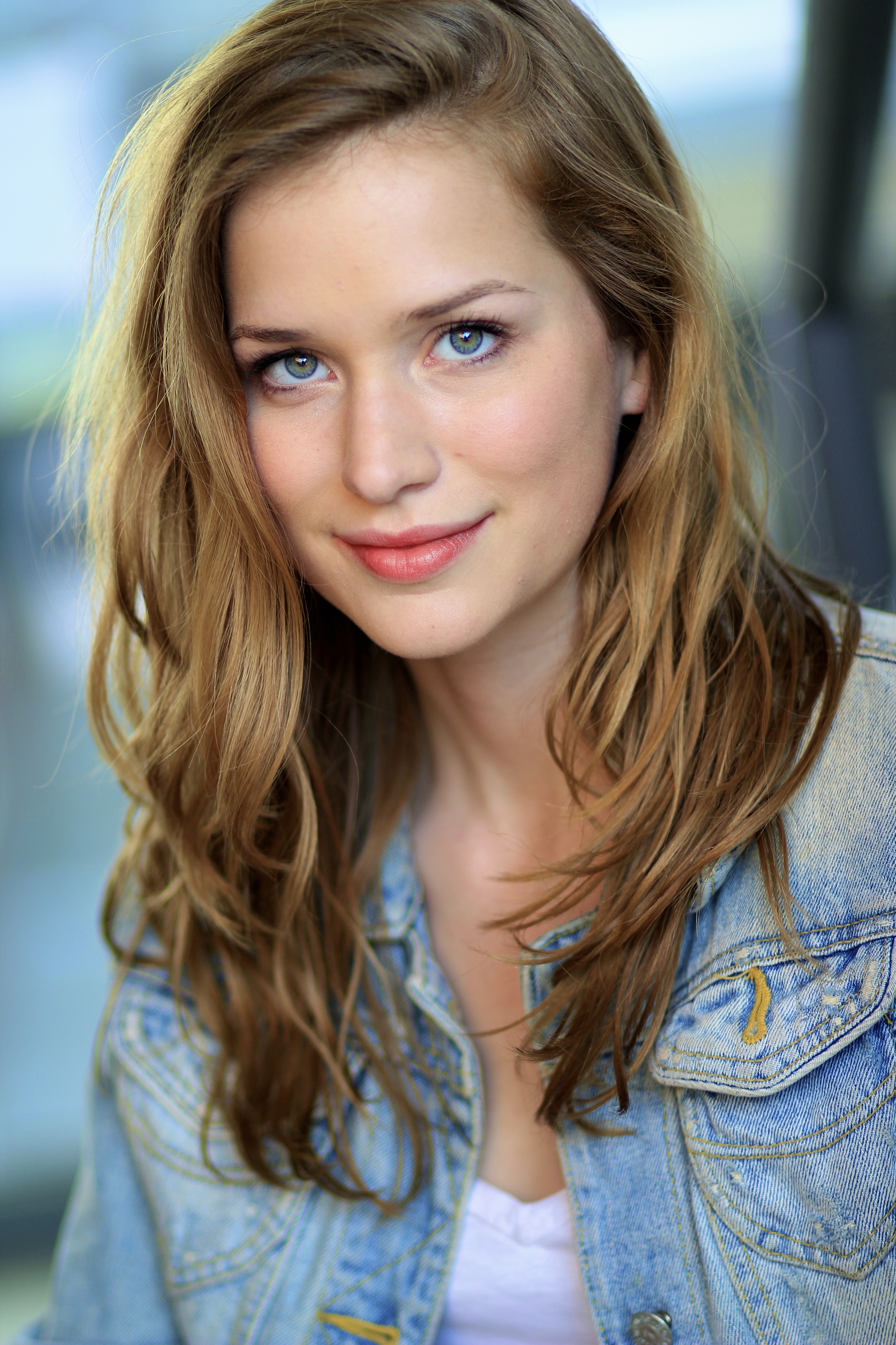 People 3456x5184 women actress Elizabeth Lail denim jacket jacket smiling portrait white tops gray eyes red lipstick long hair looking at viewer closed mouth Caucasian young women blue jacket portrait display closeup