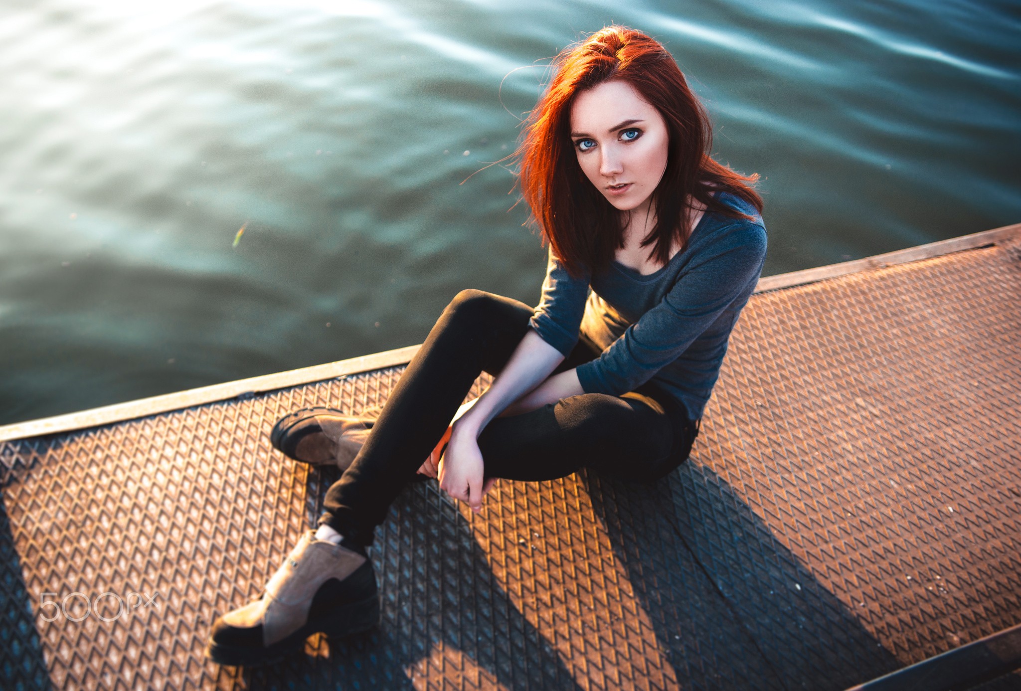 People 2048x1386 women redhead sitting pants looking at viewer water portrait blue eyes women outdoors outdoors model dyed hair