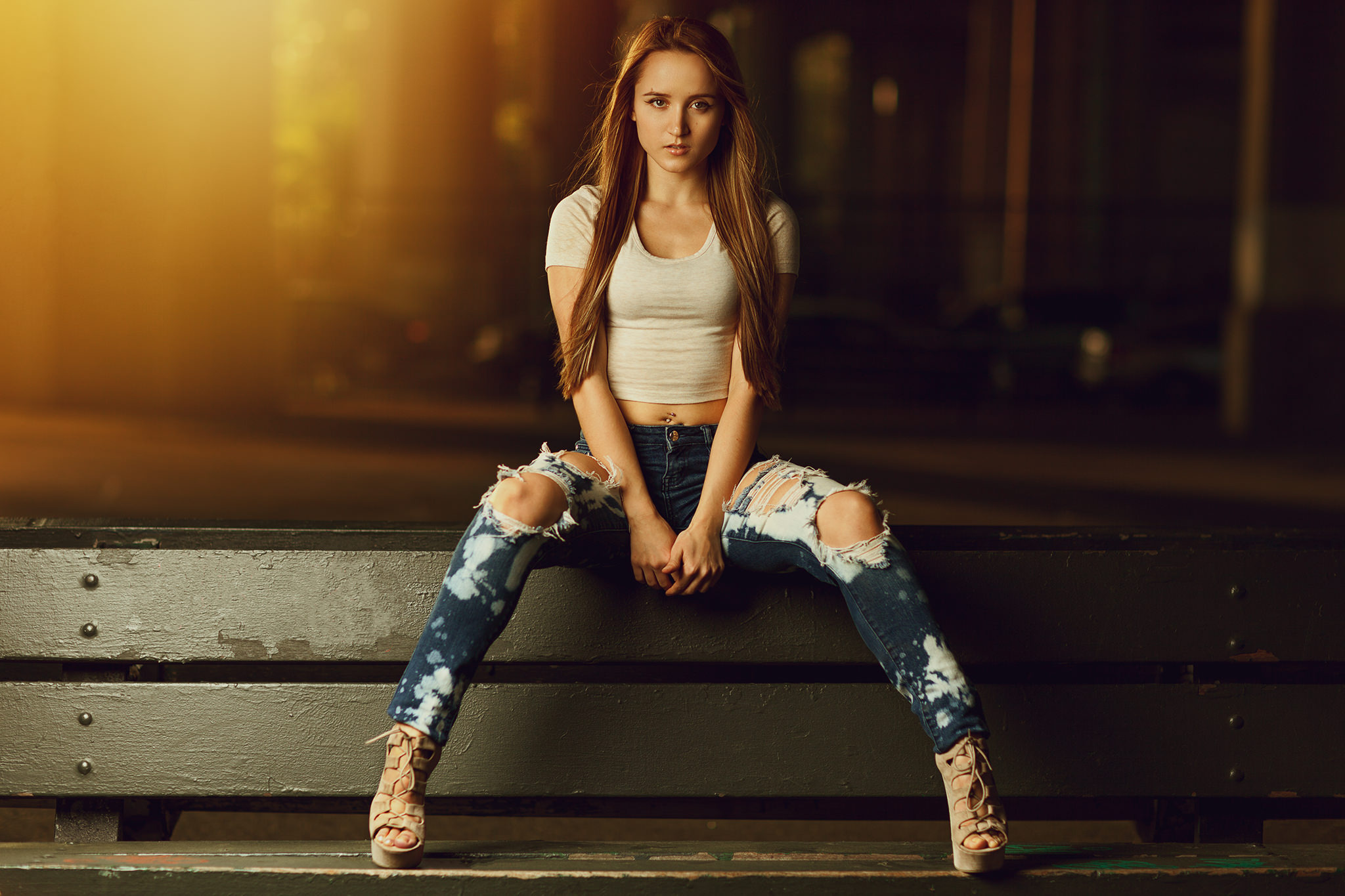 People 2048x1365 women sitting pierced navel depth of field jeans torn jeans high heels long hair bench blonde short tops white tops spread legs on bench torn clothes frontal view short sleeves platform shoes blue  jeans model