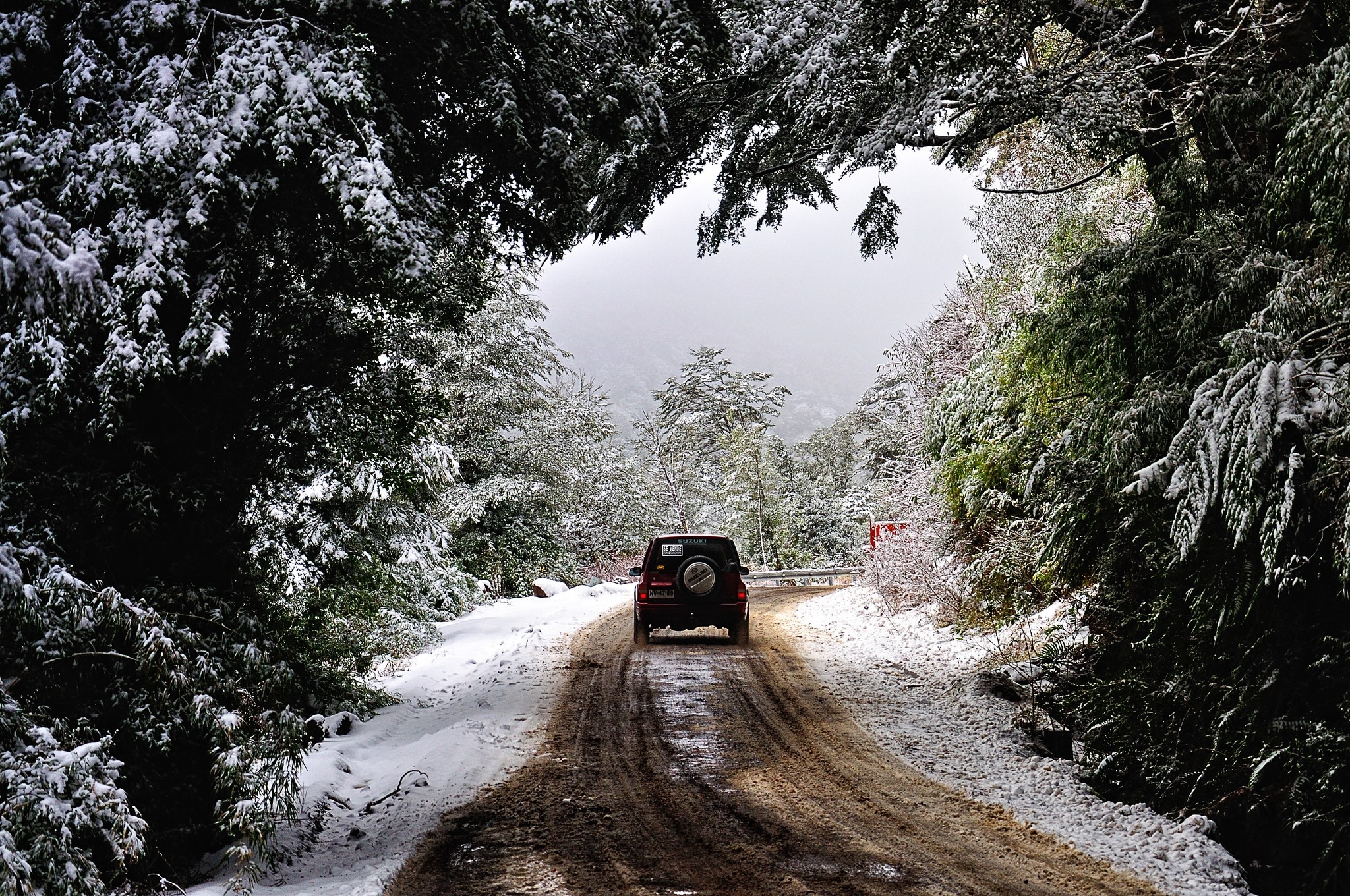 General 2048x1360 nature photography winter forest dirt road snow cold 4x4 trees national park Chile car vehicle South America