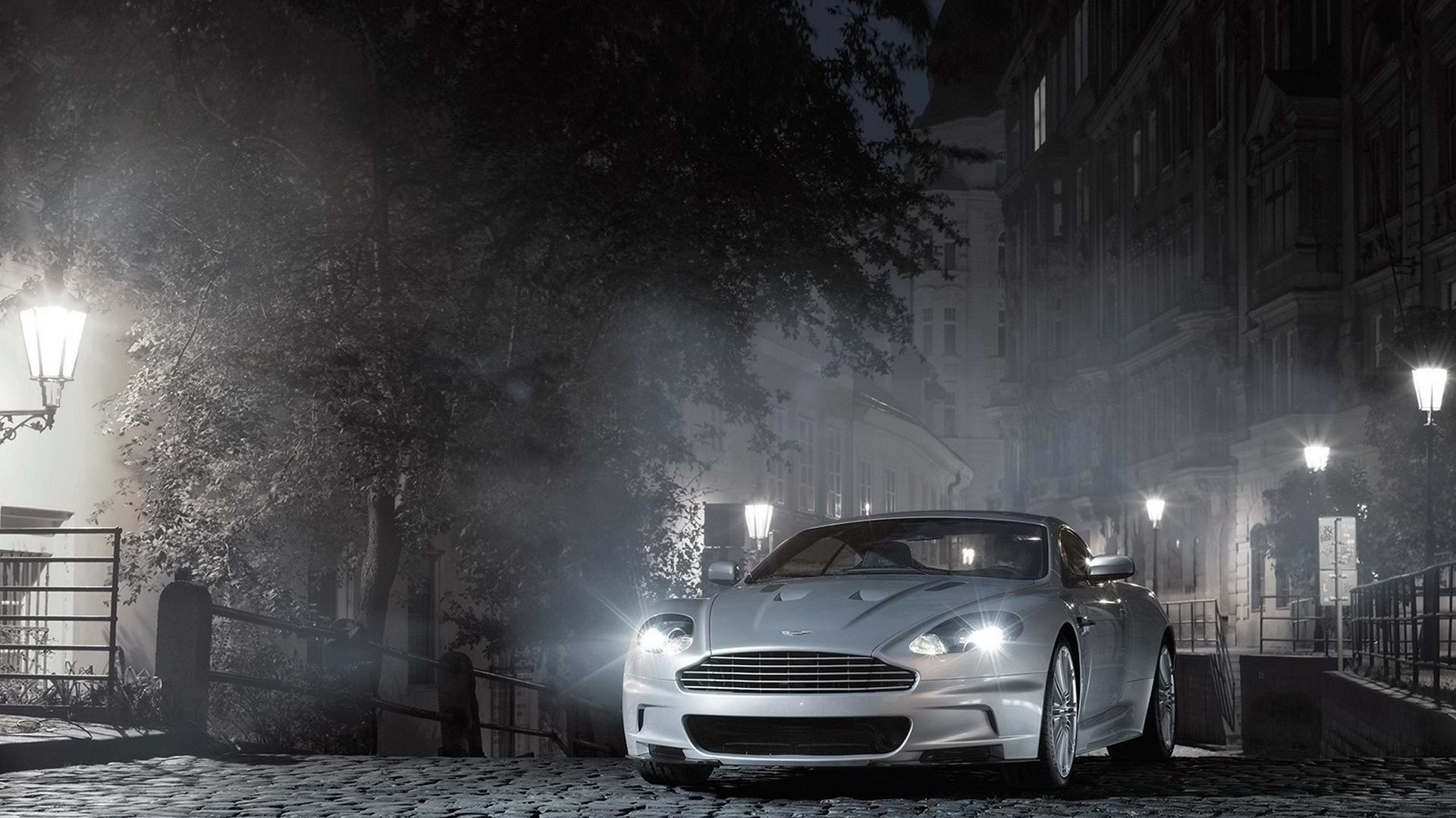 General 1920x1080 car street light trees mist cityscape night Aston Martin Aston Martin DBS vehicle British cars