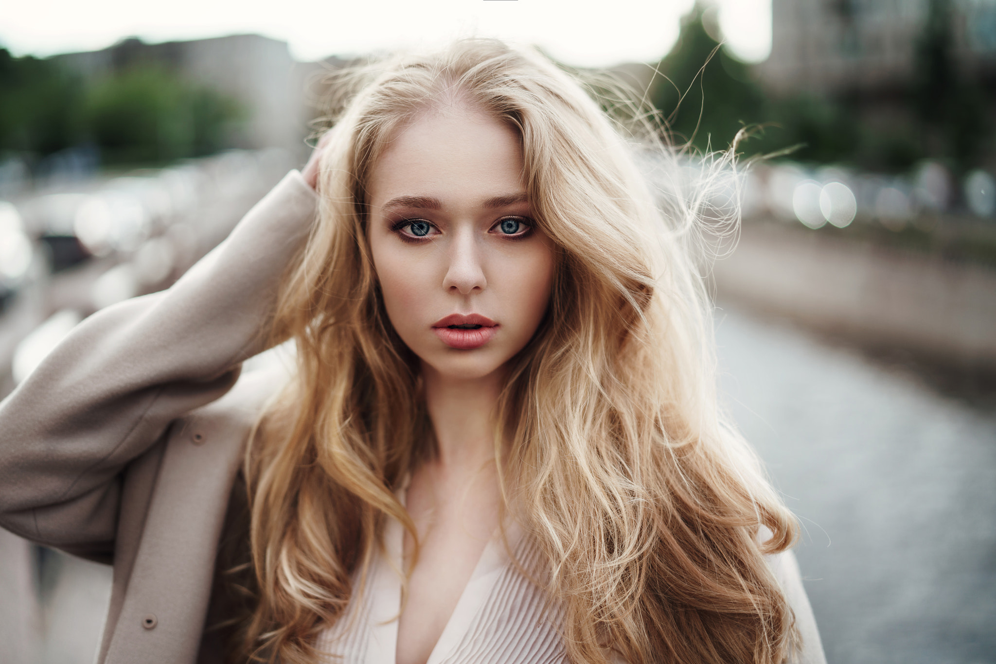 People 2048x1366 women blonde Galina Tcivina portrait face blue eyes coats white coat closeup pale windy open coat glamour hands on head women outdoors urban looking at viewer model parted lips glamour girls young women messy hair