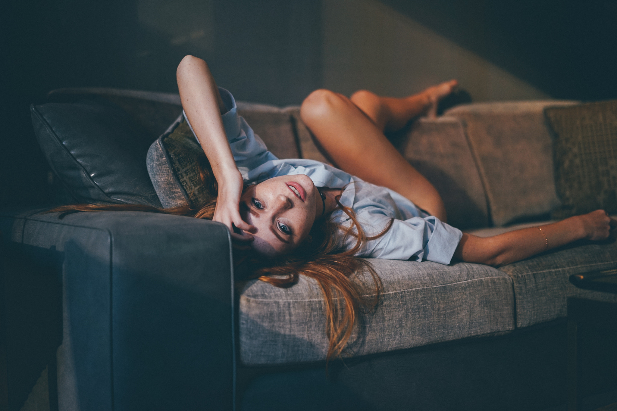 People 2048x1365 women redhead blue eyes blue shirt legs legs up lying on back looking at viewer couch Edward Barnieh