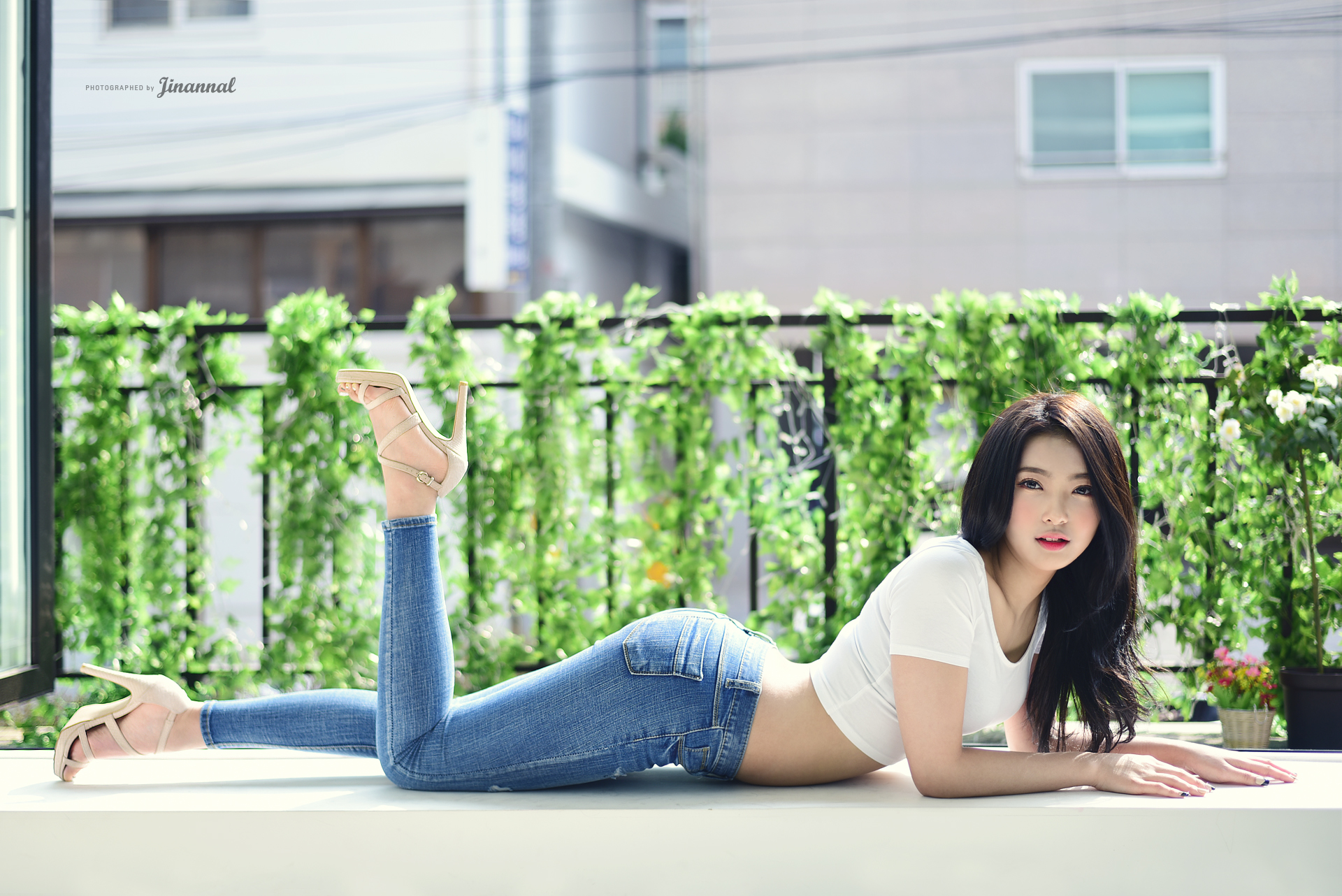 People 1920x1282 Shin Bi Asian jeans short tops T-shirt high heels black hair white tops tight jeans looking at viewer brunette women model lying on front watermarked