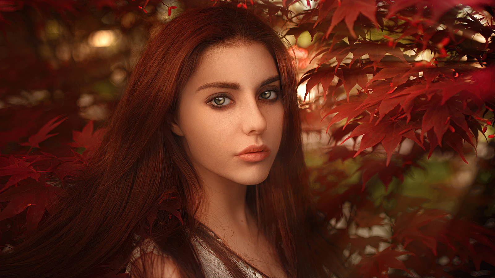 People 1600x900 leaves women women outdoors sunlight warm looking at viewer green eyes nature model face portrait photography Dmitriy Ponibudlas