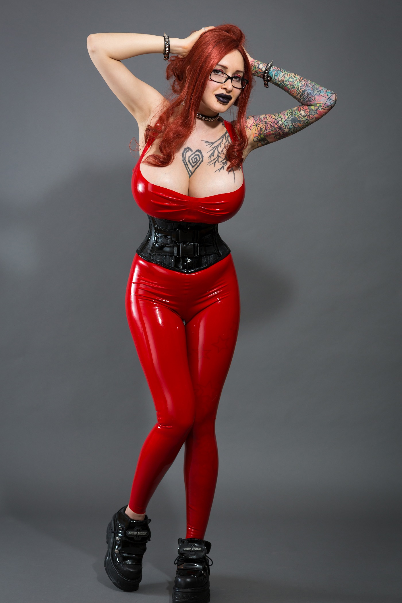 People 1400x2100 Ariane Saint-Amour latex women big boobs fake boobs Canadian Canadian women model redhead glasses women with glasses makeup black lipstick hands on head armpits tattoo boobs cleavage red bodysuit corset standing sneakers studio