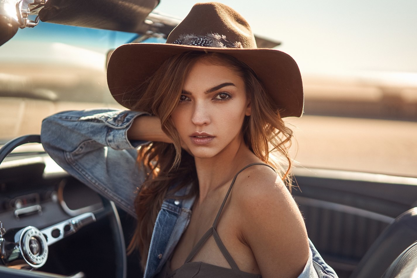 People 1425x950 women model brunette long hair Colleen Cole brown eyes denim jacket cabriolet cabrio bare shoulders women outdoors hat looking at viewer face sensual gaze