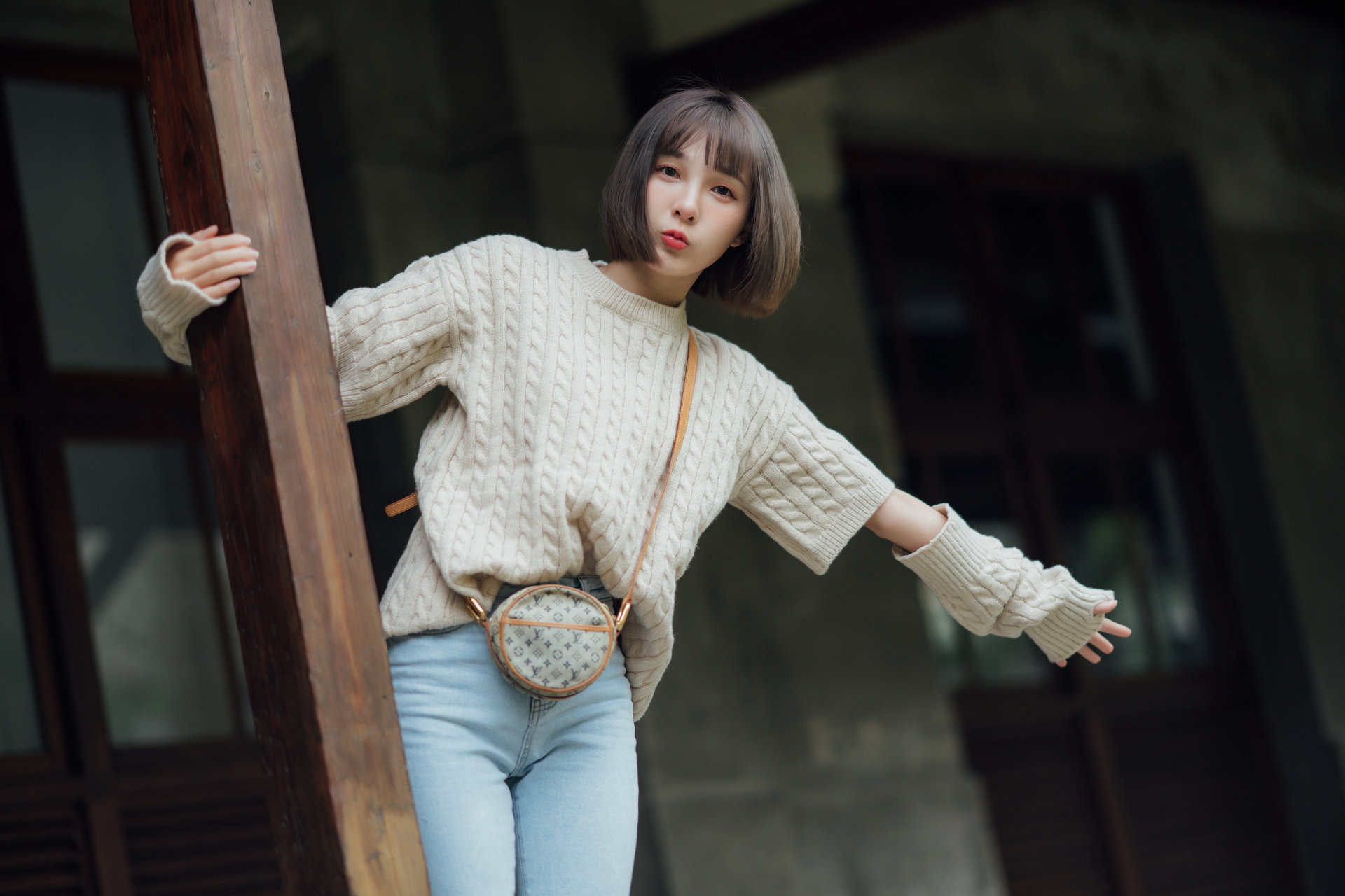 People 1920x1280 Asian model women short hair dark hair jeans pullover bag arm warmers depth of field