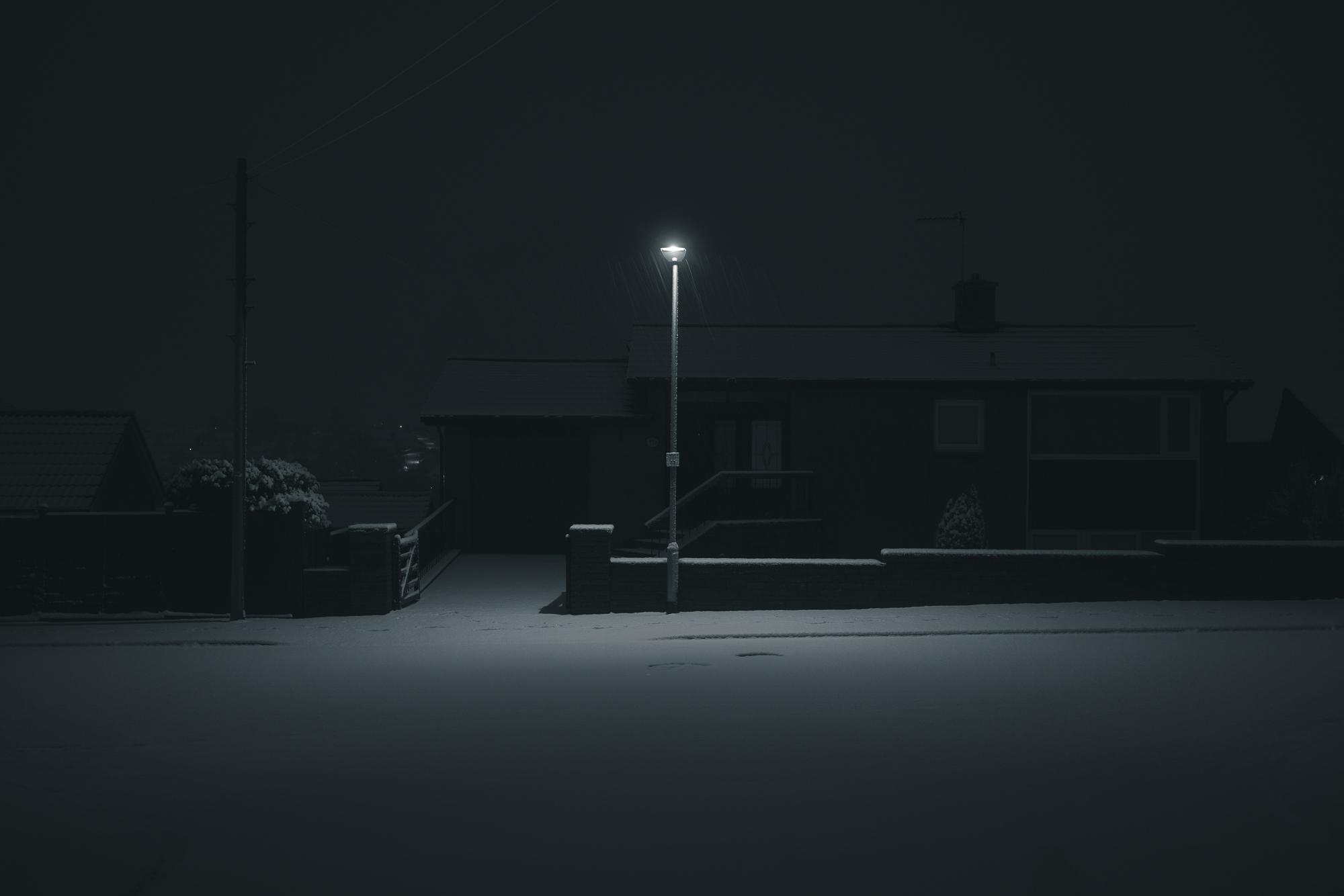 General 2000x1334 night street light dark background suburb city lights monochrome snow
