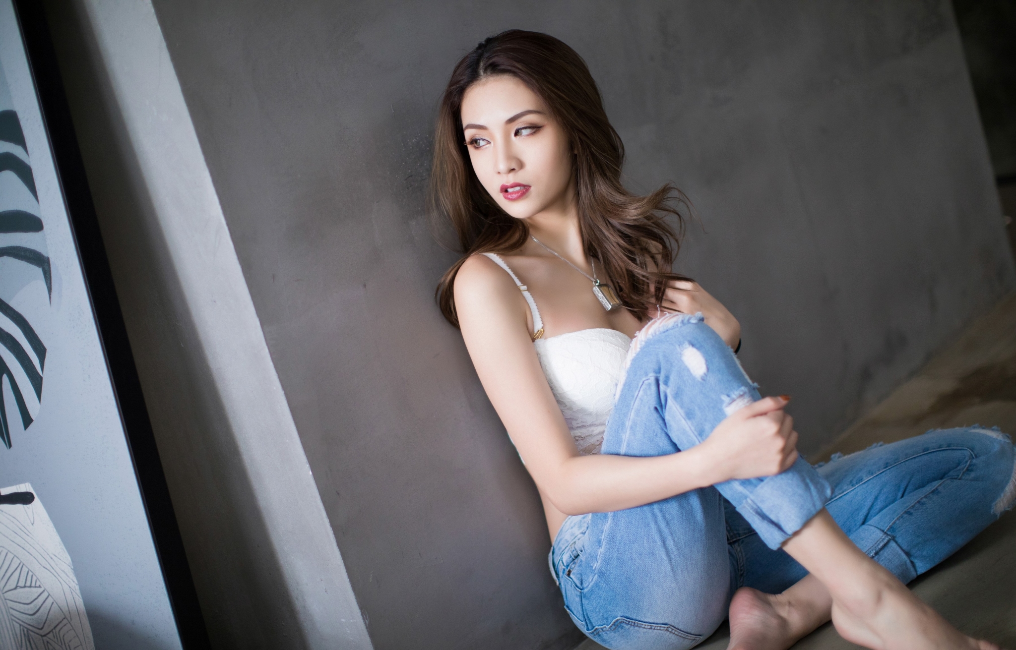 People 2048x1311 women model Asian brunette looking away necklace bra white bra torn jeans sitting barefoot on the floor touching hair
