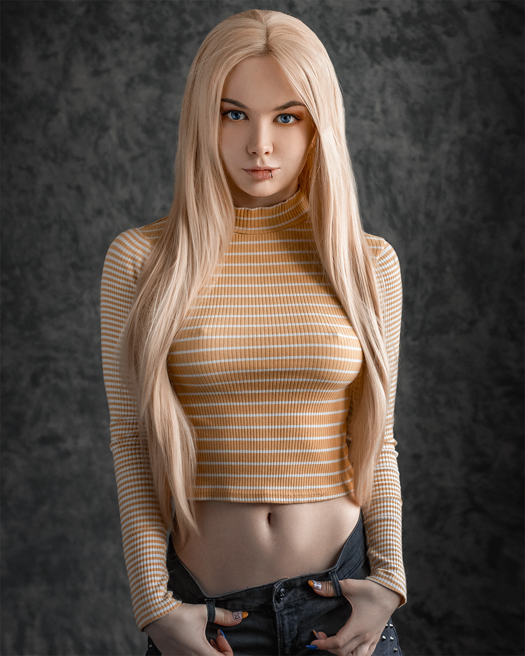 People 1080x1350 women Alexandra Bessonova blonde long hair straight hair blue eyes looking at viewer piercing pierced lip makeup blouses belly pants nipples through clothing bare midriff nipple bulge knit fabric sweater jeans