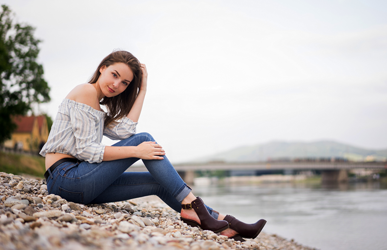 People 1280x828 model brunette women long hair bare shoulders touching hair hand on leg jeans riverside brown boots blue pants makeup women outdoors tight pants black belt leather boots young women