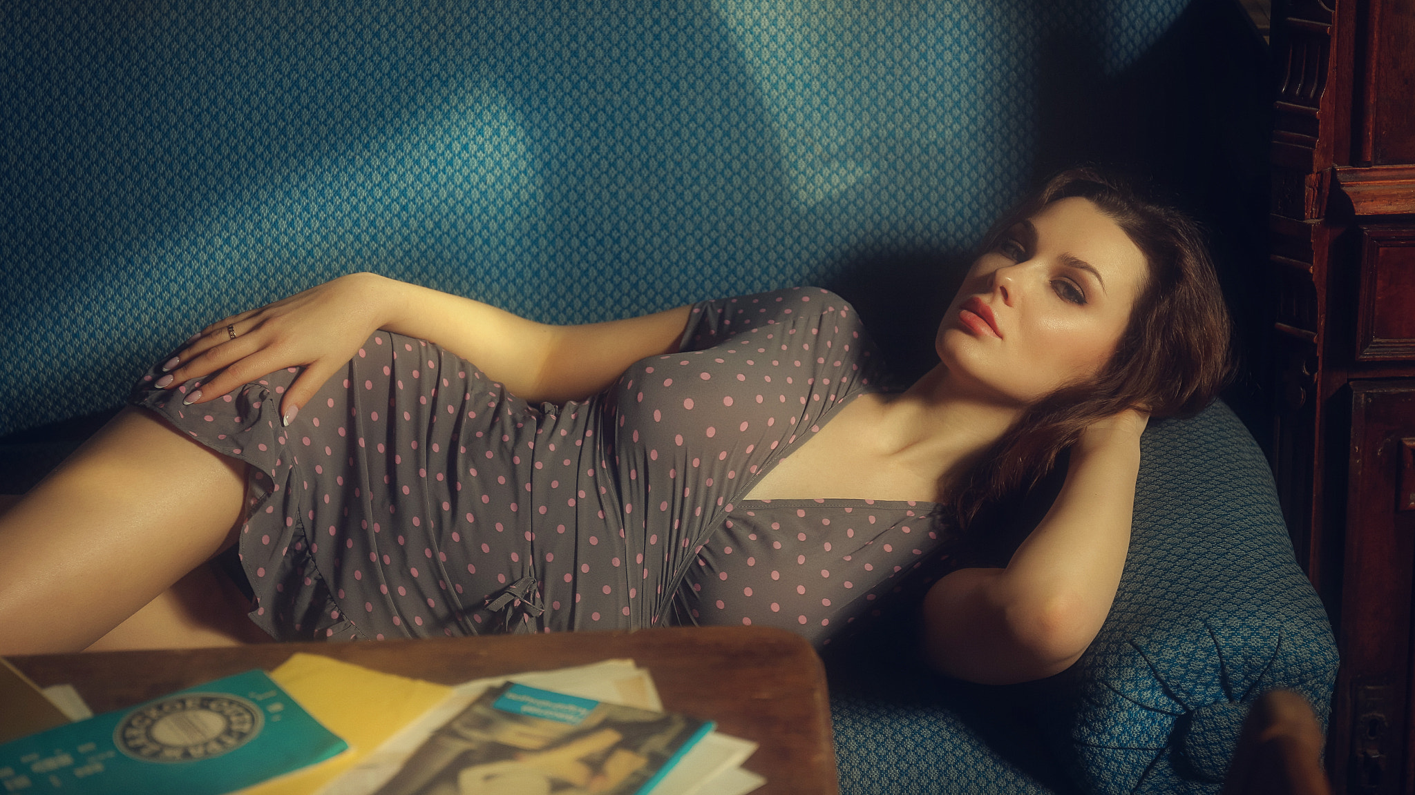 People 2048x1152 Vadim Aksyonov women brunette looking at viewer dress dots lying on side couch Kristina Fedorov