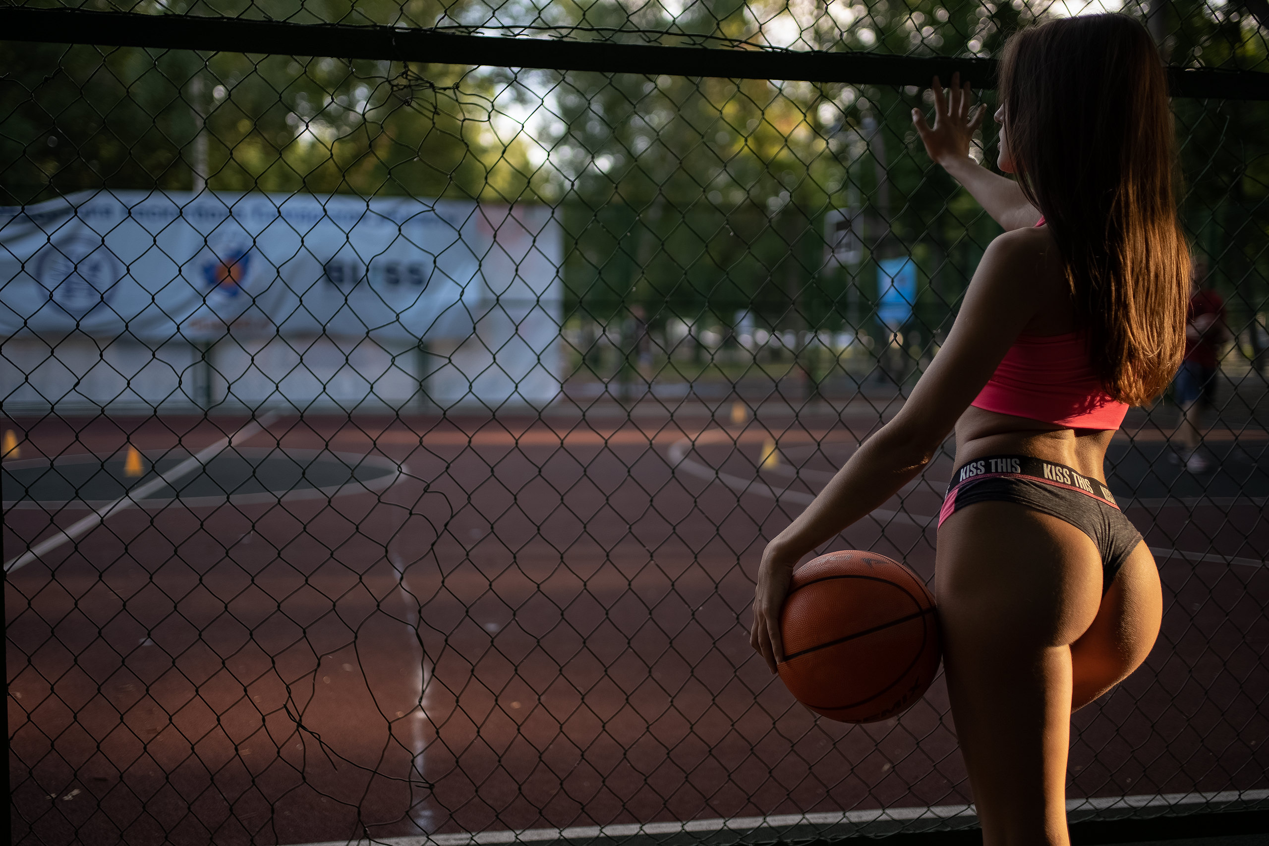People 2560x1707 women basketball court ball sportswear brunette women outdoors ass trees sunlight tank top Alina Naumenko rear view fence iron fence Vladimir Tomarov