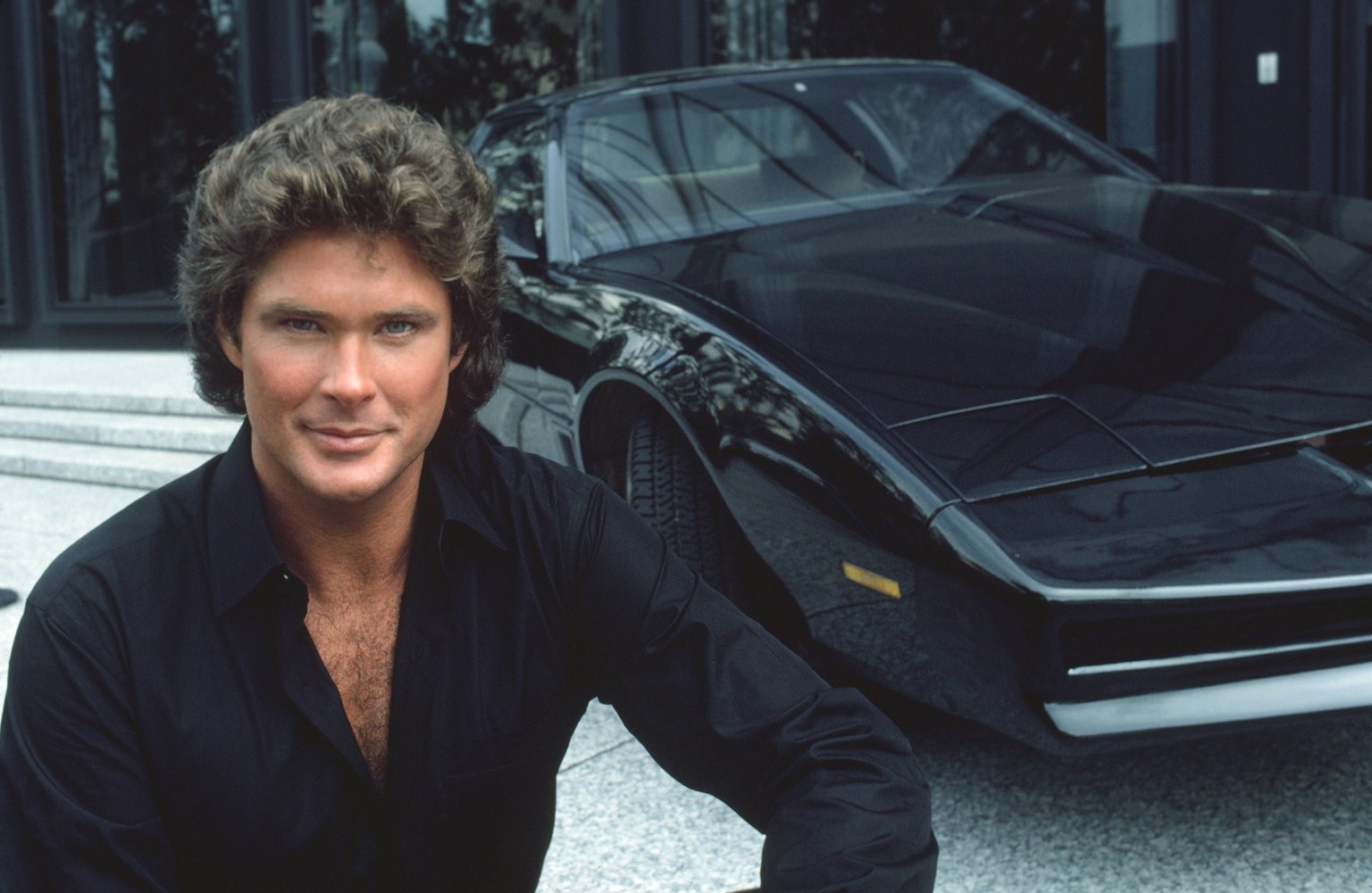 People 1536x1001 men actor TV series David Hasselhoff K.I.T.T. Michael Knight car Pontiac black cars looking at viewer 1980s smiling shirt building outdoors Knight Rider face legend pop-up headlights frontal view