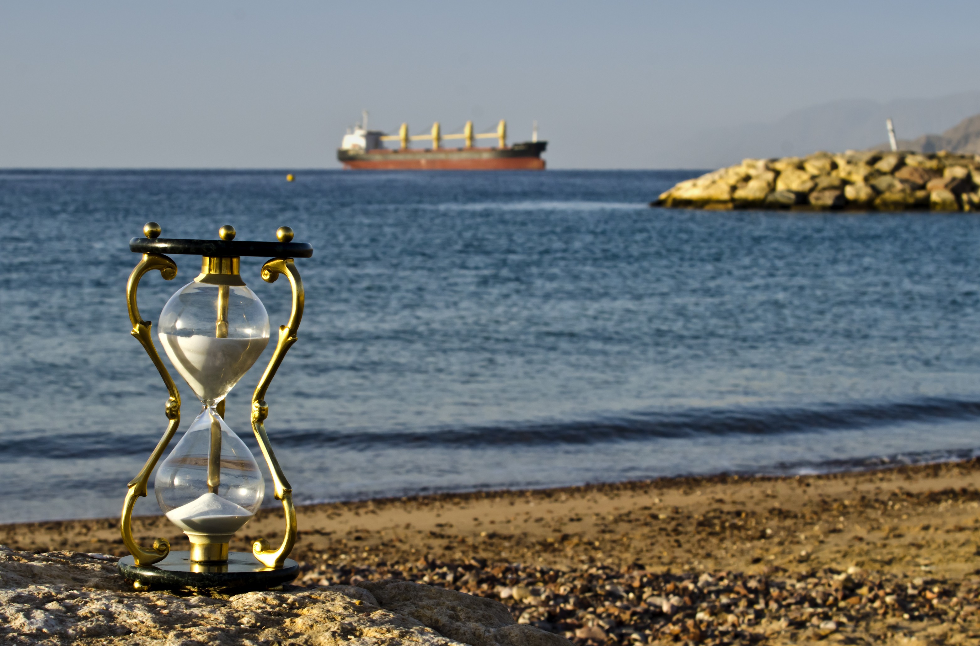 General 3123x2059 hourglasses sea sand ship beach coast stones rocks horizon depth of field time outdoors vehicle