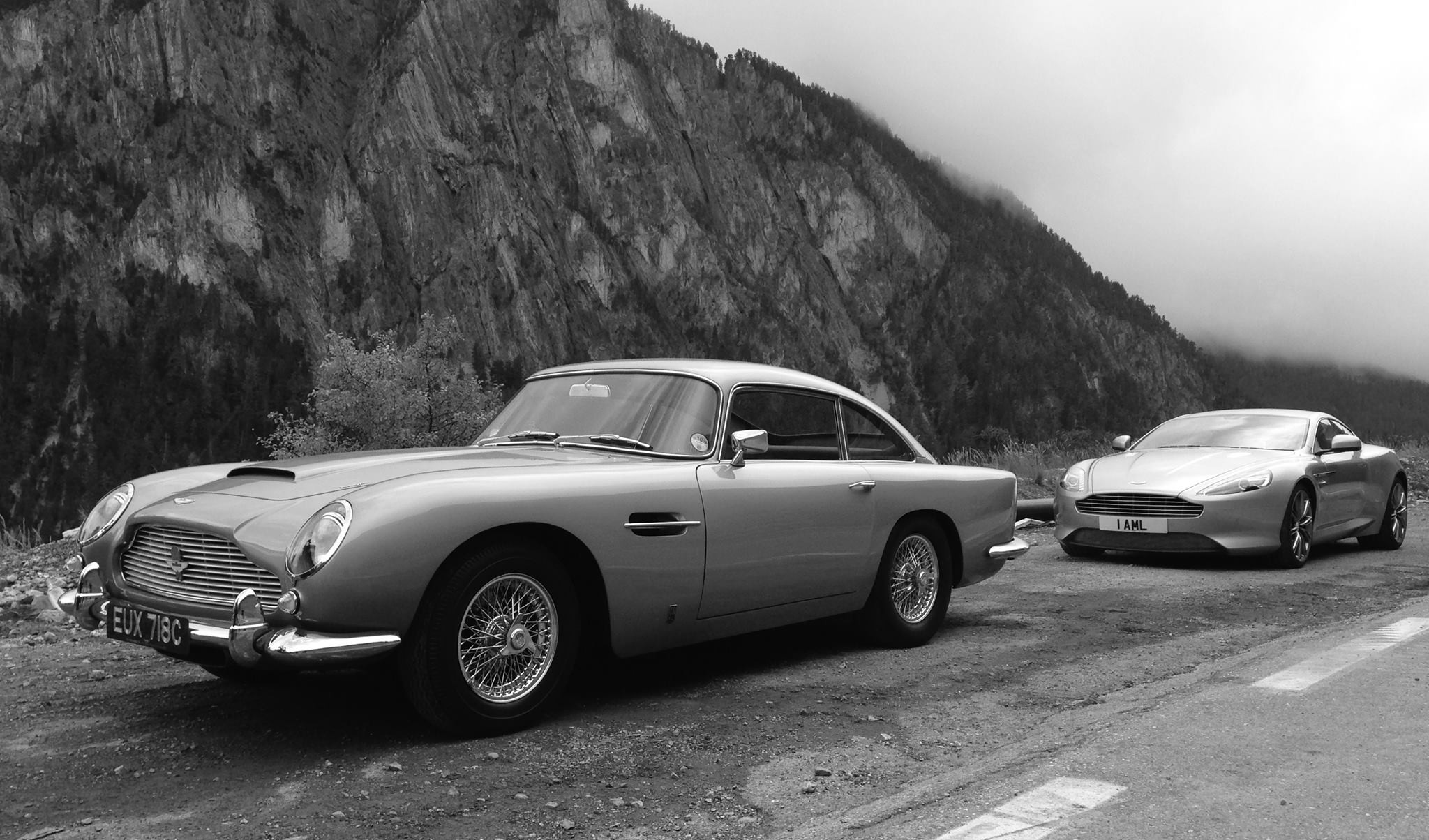 General 2048x1204 vehicle car old car classic car Aston Martin Aston Martin DB5 Aston Martin DB9 road monochrome mist mountains trees British cars