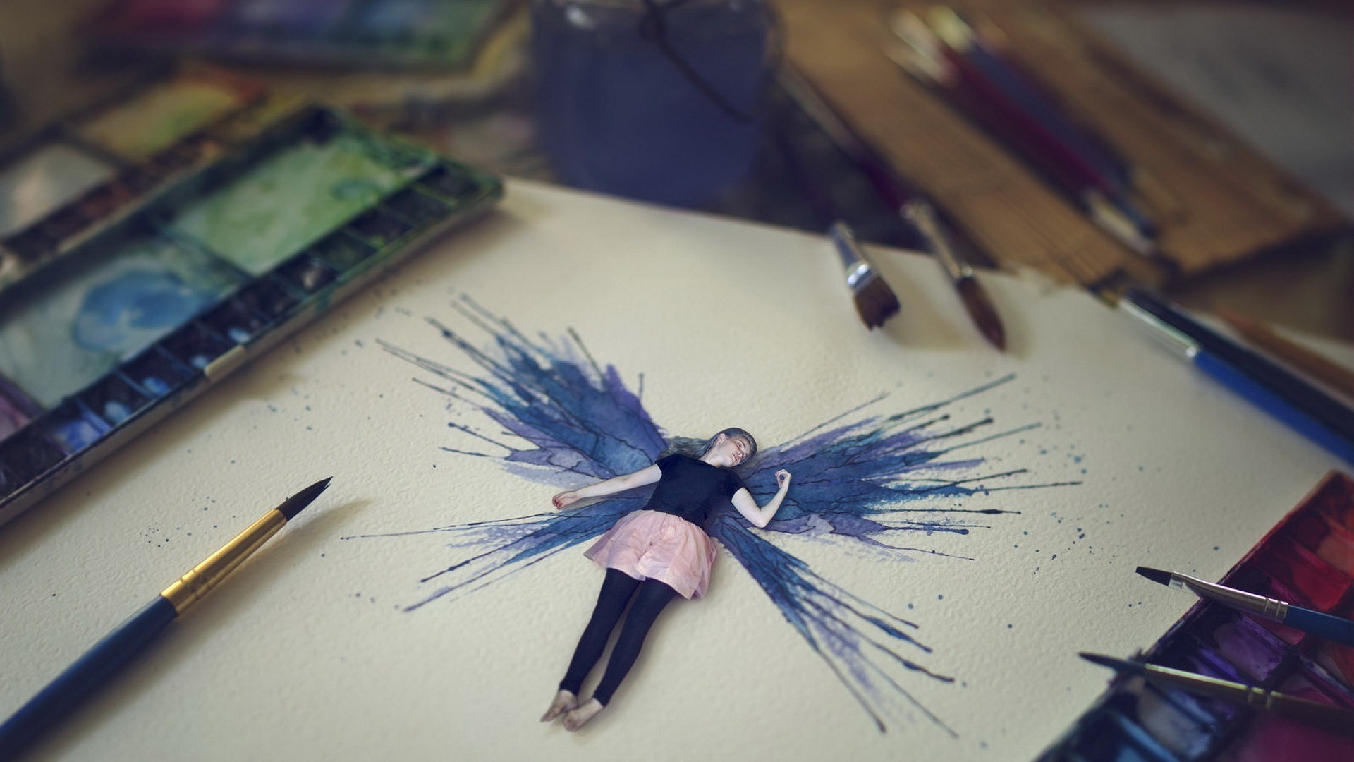 General 1920x1080 fantasy art women photo manipulation wings painting paint brushes paper lying on back colorful depth of field black top skirt barefoot miniatures