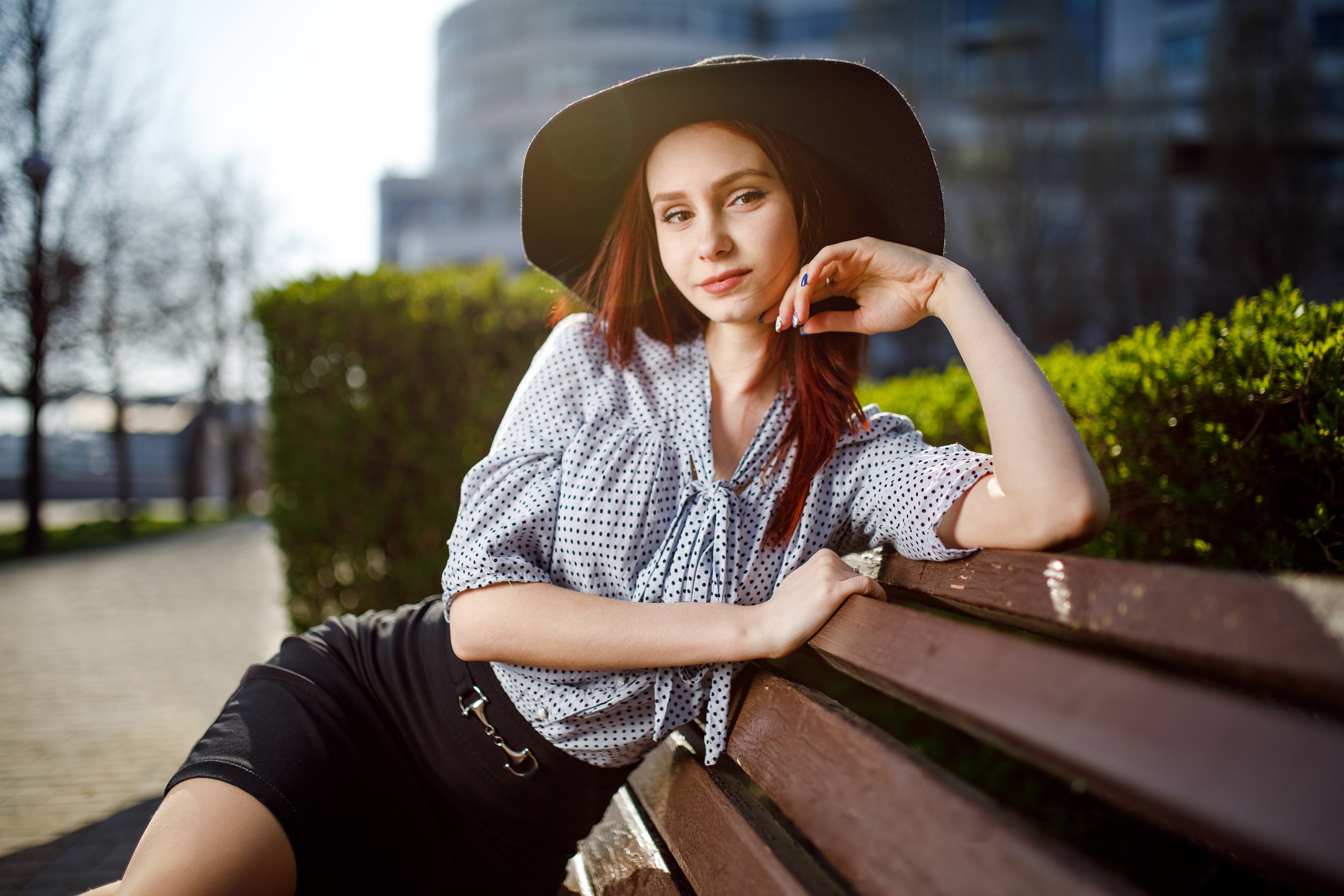 People 2560x1707 women model redhead portrait outdoors women with hats hat blouses skirt black skirts sitting bench bushes depth of field lens flare painted nails looking at viewer women outdoors