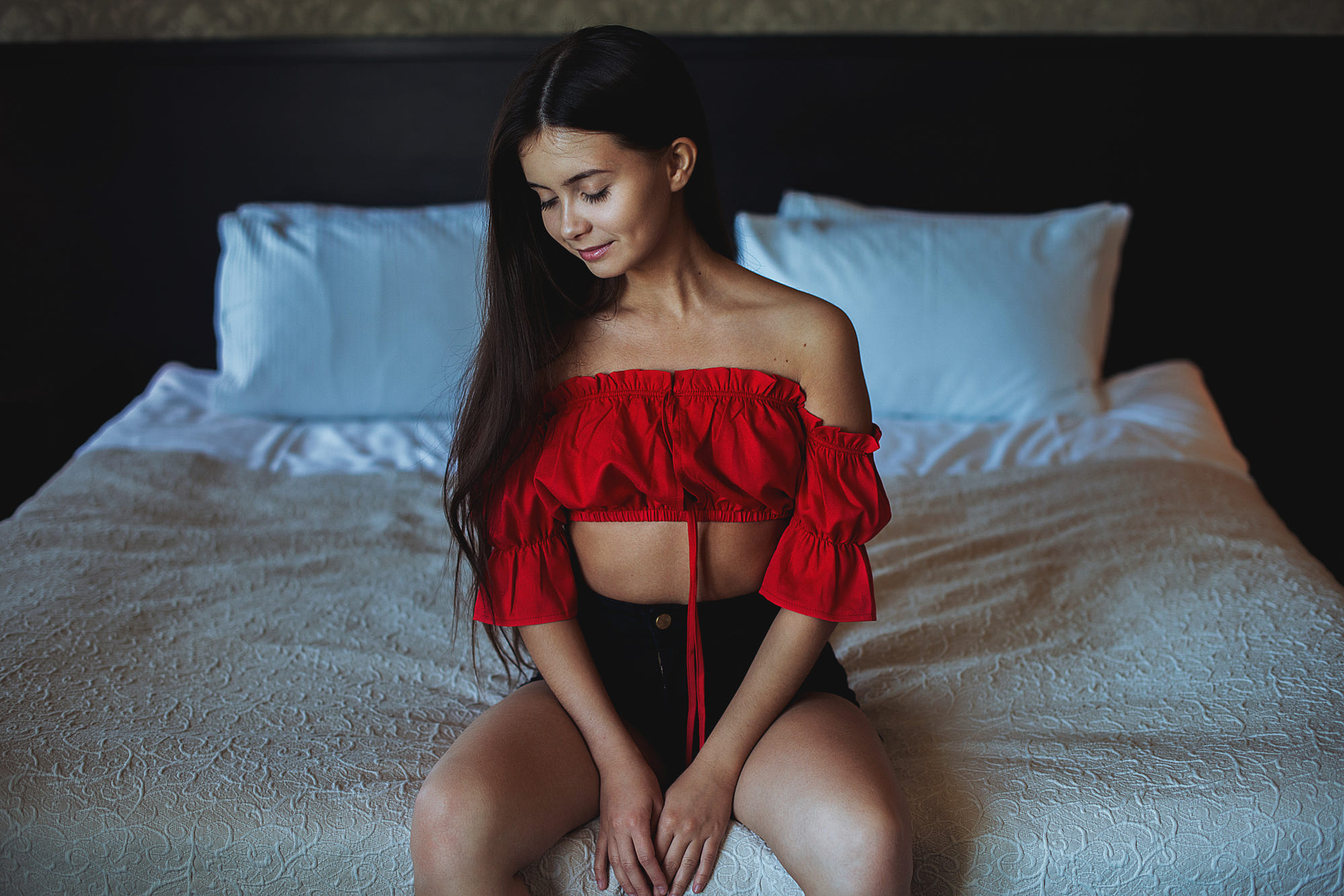 People 2000x1334 women smiling long hair bed pillow jean shorts brunette closed eyes women indoors bare shoulders high waisted shorts red shirt
