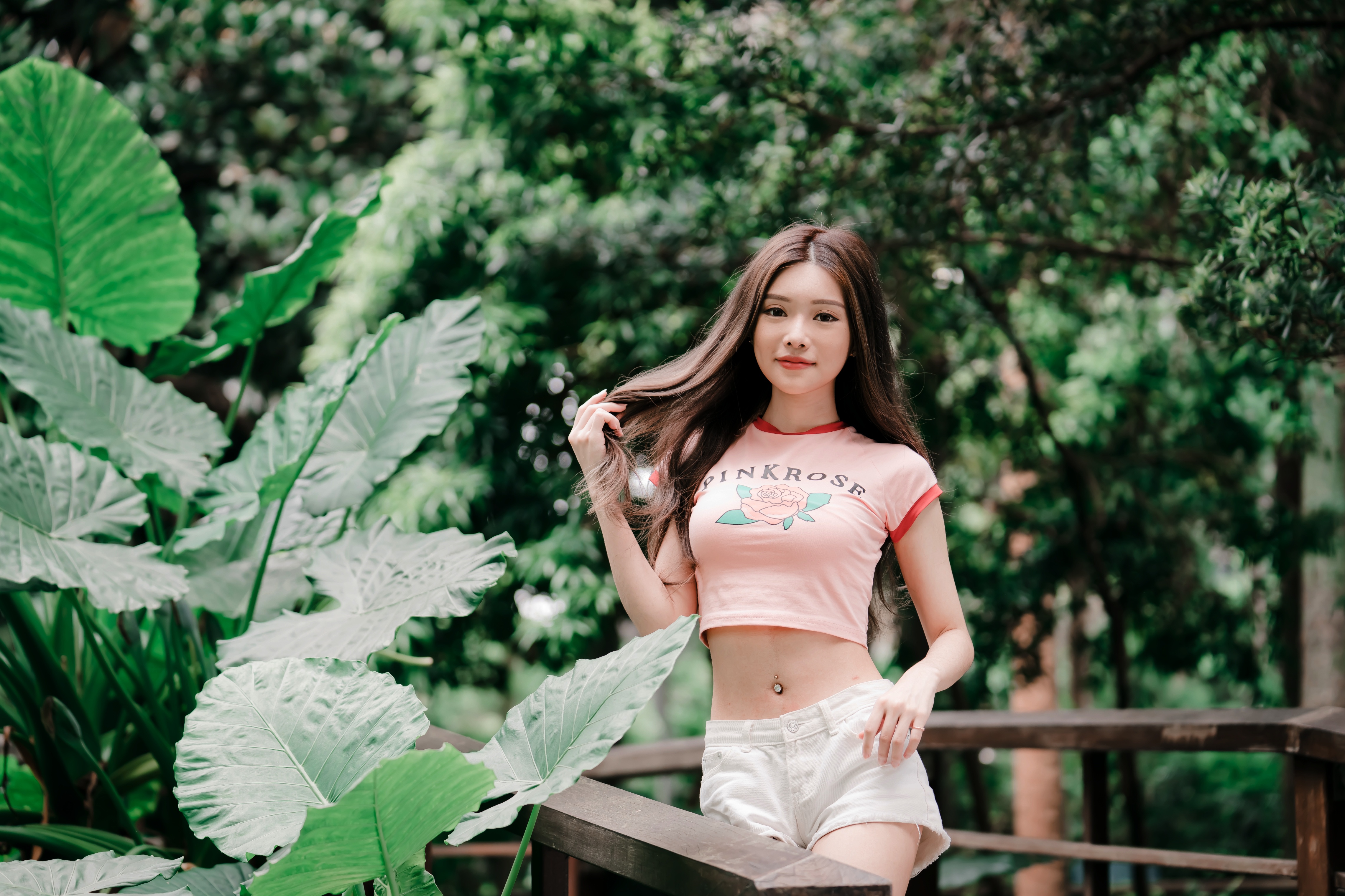 People 4562x3043 Asian women model long hair brunette pink tops shorts railing depth of field trees plants pierced navel women outdoors