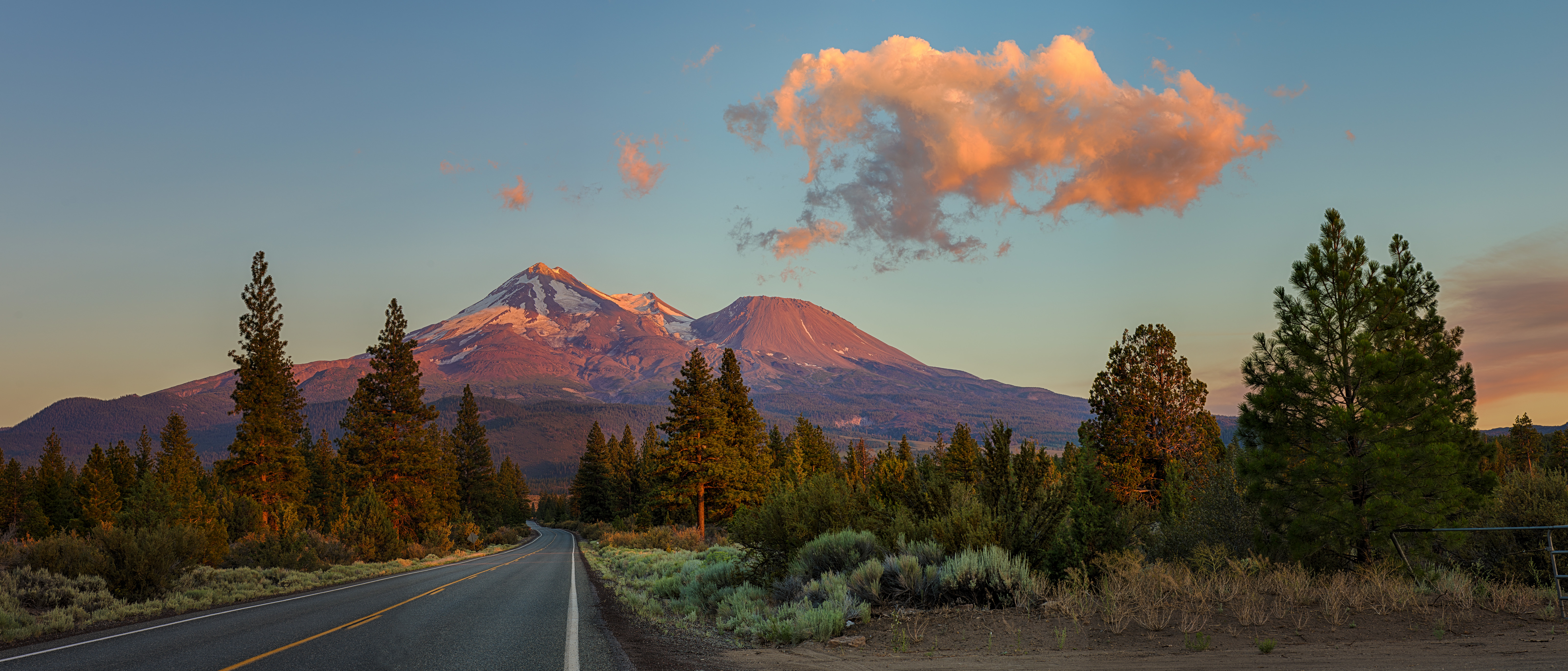 General 6144x2630 Mount Shasta California photography landscape sunset pine trees clouds sunset glow mountains snowy peak sunlight snow sky road trees
