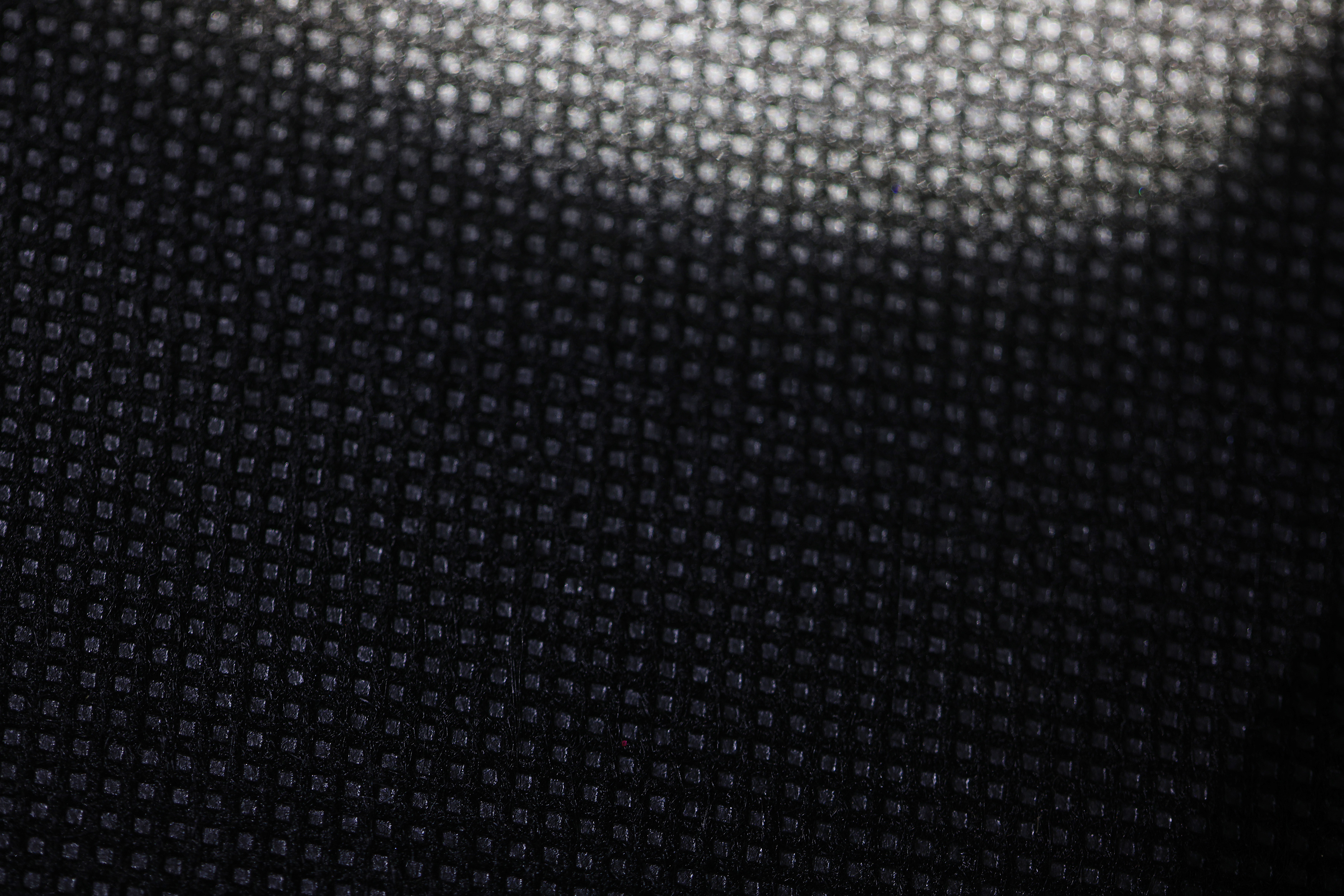 General 3500x2334 black background sweater e8 lattice macro closeup fabric