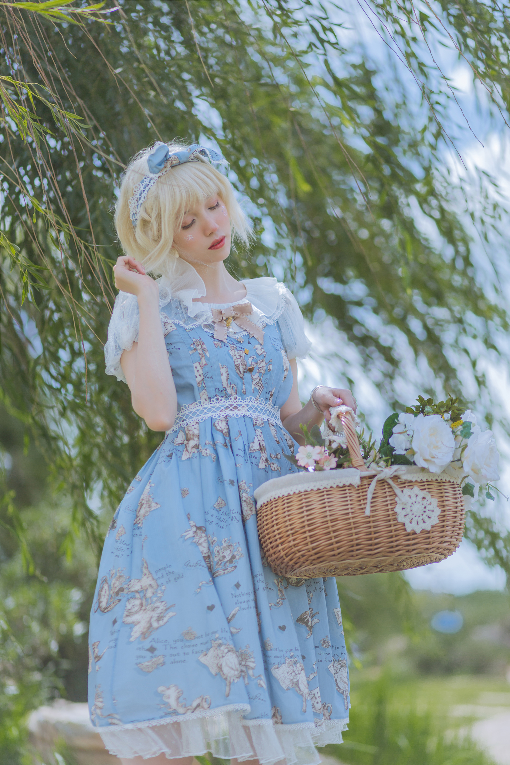 People 1680x2520 Yun XiXi photography blonde blue dress baskets blushing closed eyes trees hairband blue bow Asian women model blue clothing dress women outdoors dyed hair red lipstick