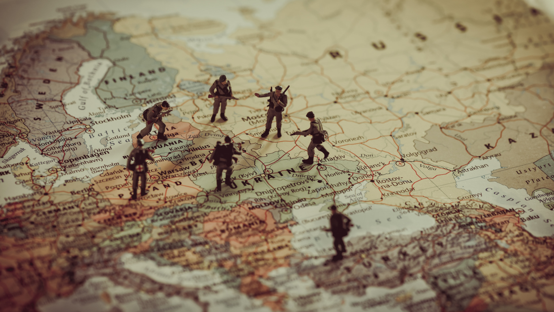 General 1920x1080 globes continents map countries miniatures soldier figurines toys depth of field closeup Europe Poland Lithuania Ukraine Russia Turkey World War II beige