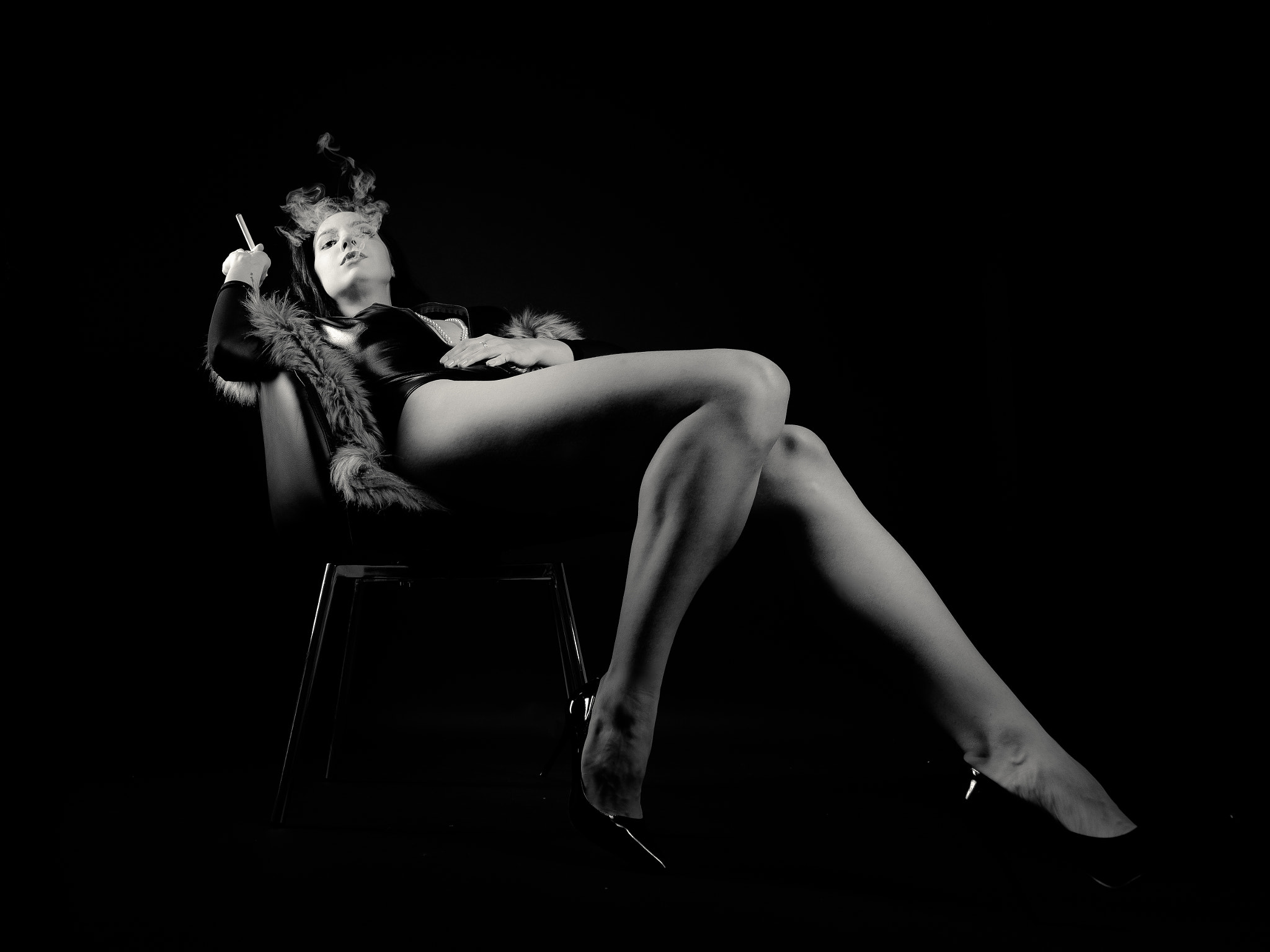 People 2048x1536 dark monochrome legs studio model women indoors women smoking cigarettes chair simple background