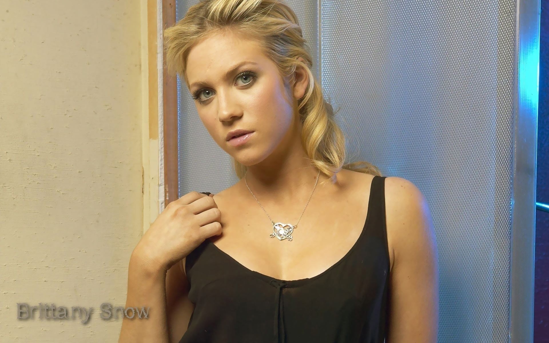People 1920x1200 women Brittany Snow actress long hair tank top black top blue eyes looking at viewer heart necklace women indoors indoors black clothing