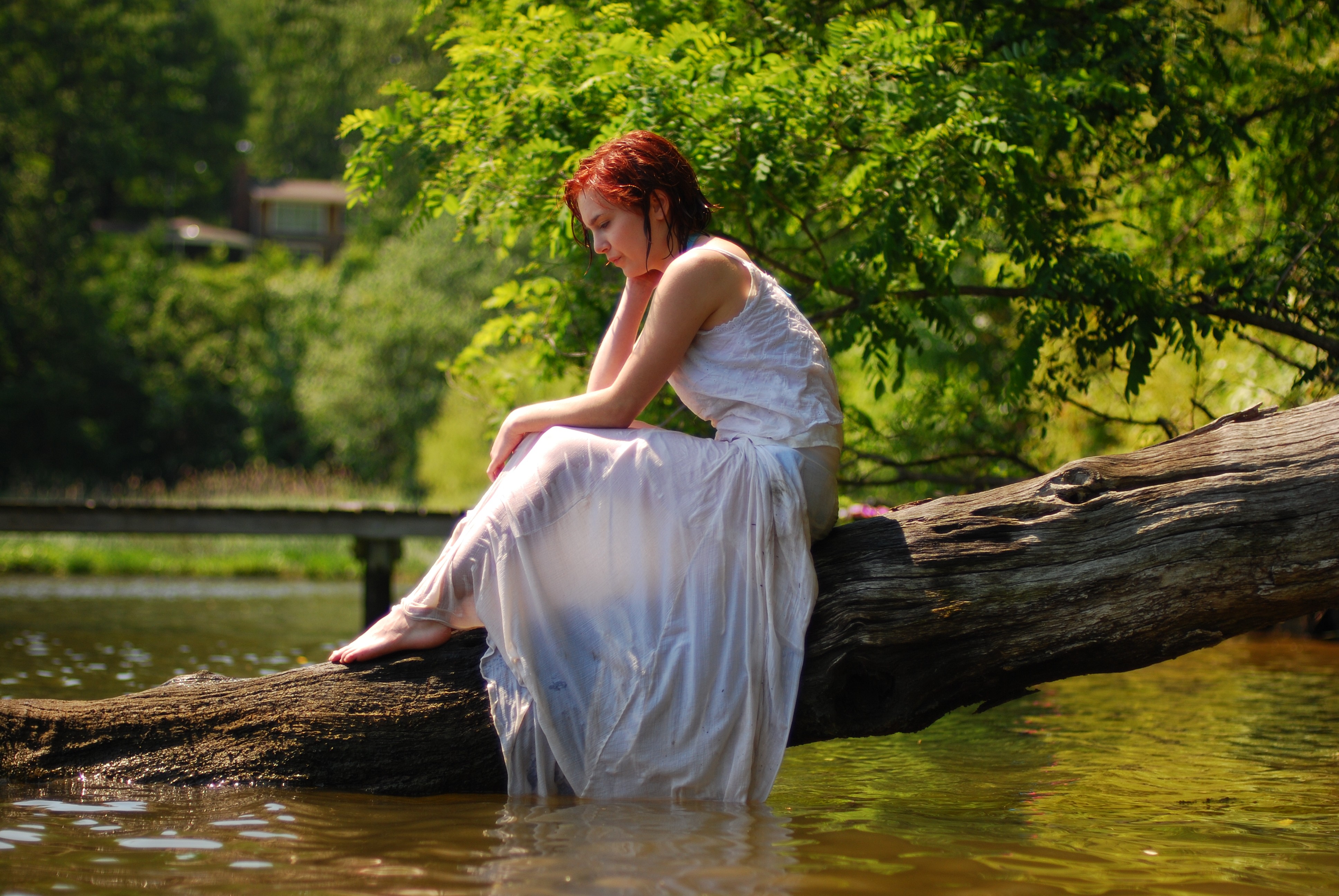 People 3872x2592 redhead women women outdoors white dress wet clothing wet hair profile see-through clothing sitting warming in sunlight barefoot log wet wood water dyed hair white clothing model