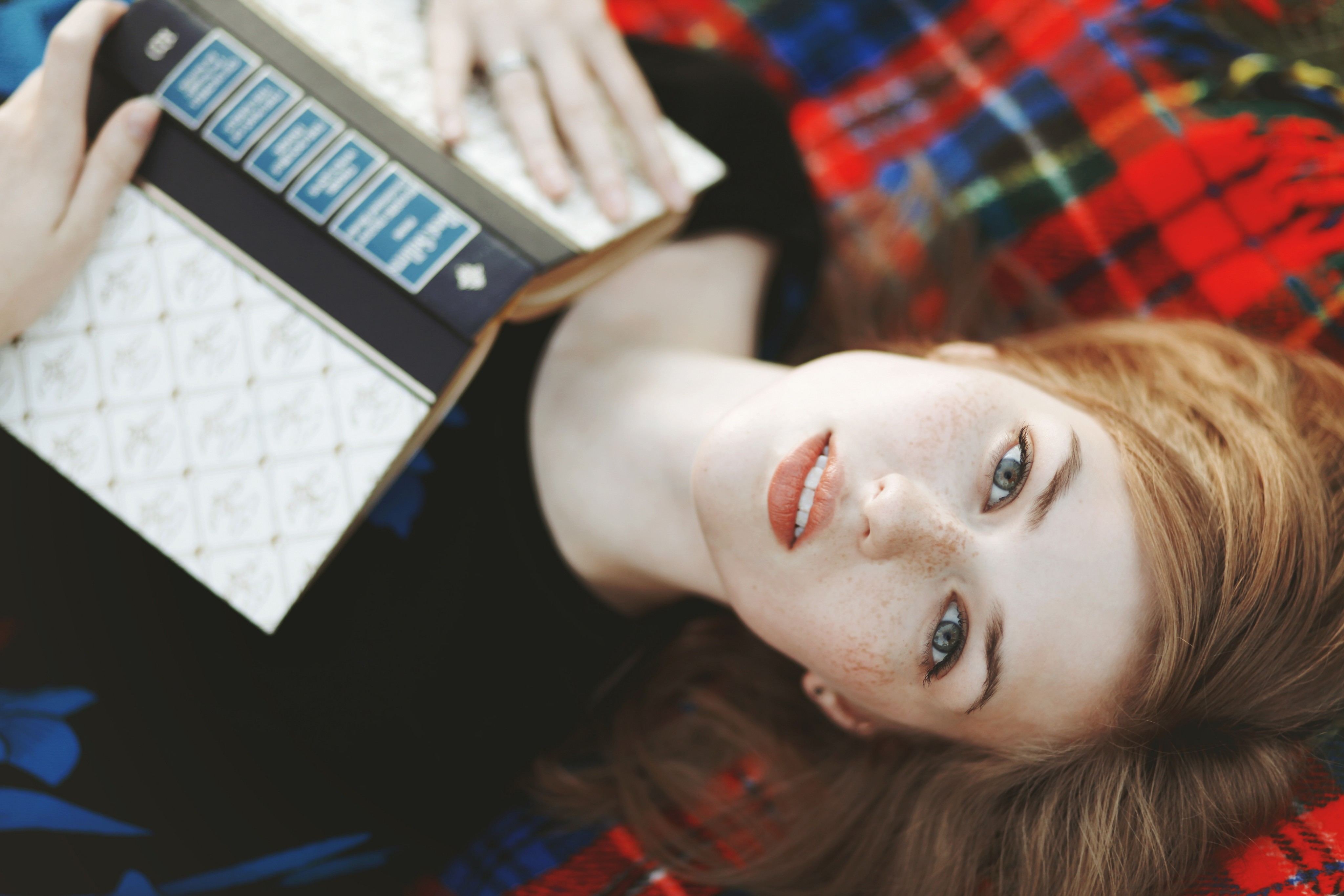 People 4096x2731 women redhead freckles books looking at viewer lying on back tartan introvert model pale face