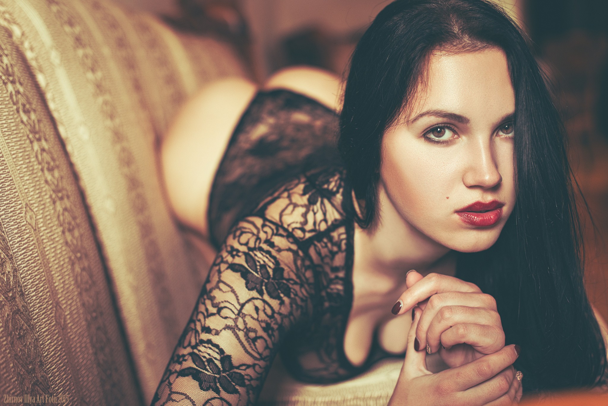 People 2048x1367 women model black hair red lipstick cleavage brown eyes lying on front ass colored nails face see-through clothing Ilya Zhirnov women indoors indoors closeup red nails painted nails