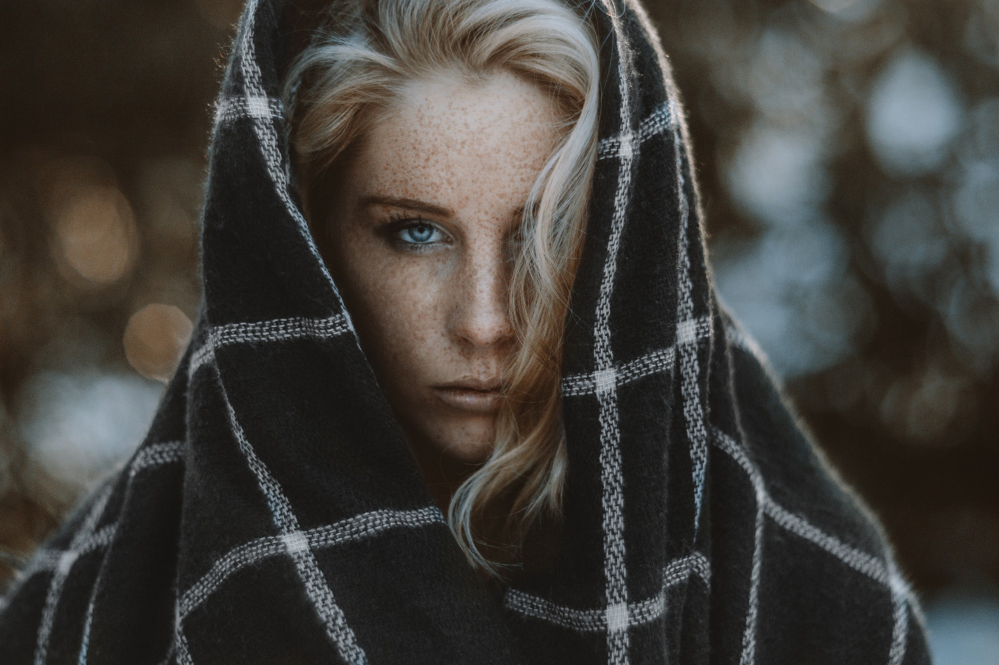 People 2000x1333 women blonde hair in face blue eyes blankets face looking at viewer freckles Camille Rochette women outdoors in blanket outdoors closeup