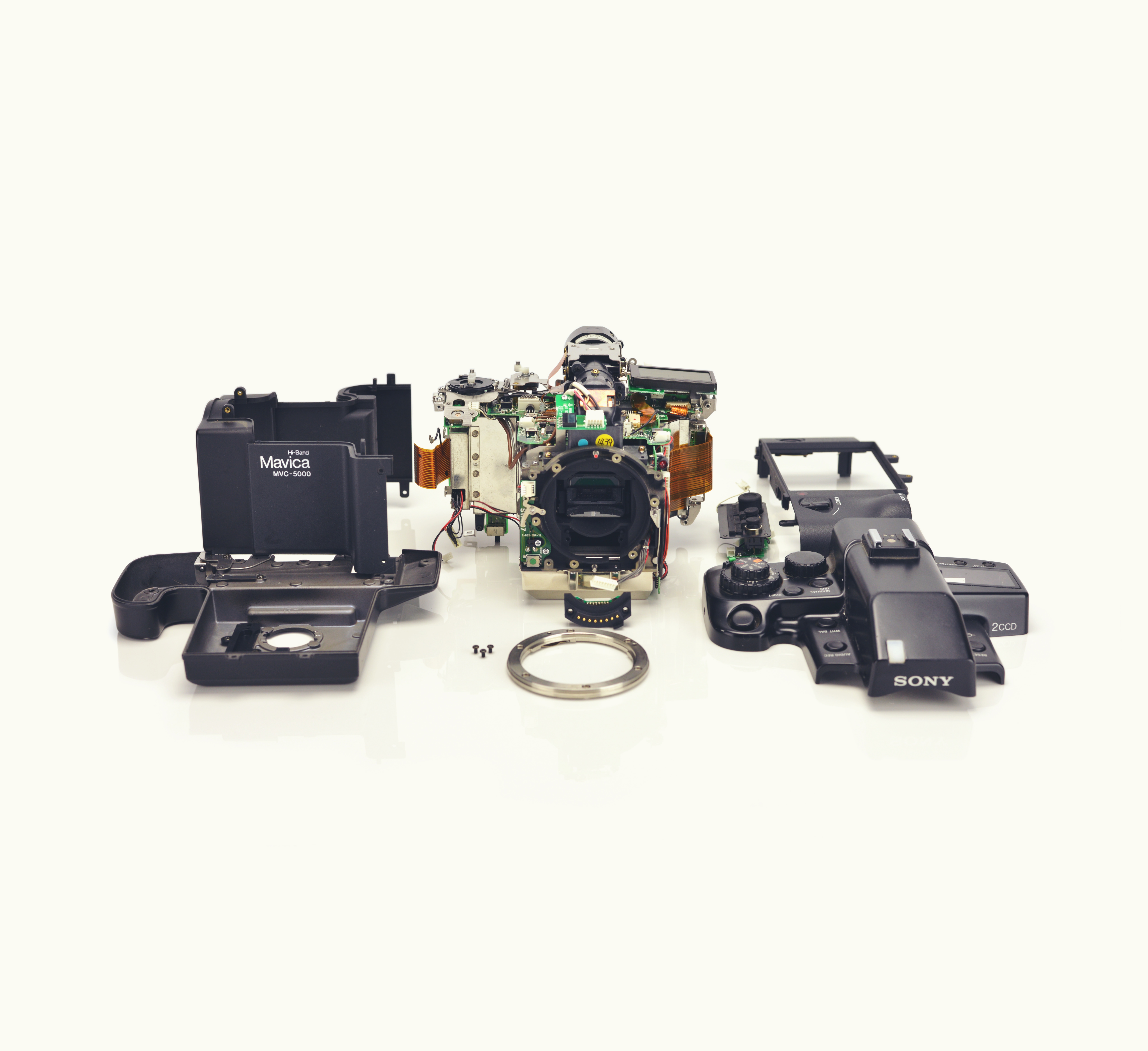 General 8194x7499 disassembly camera simple background white background Sony parts technology minimalism