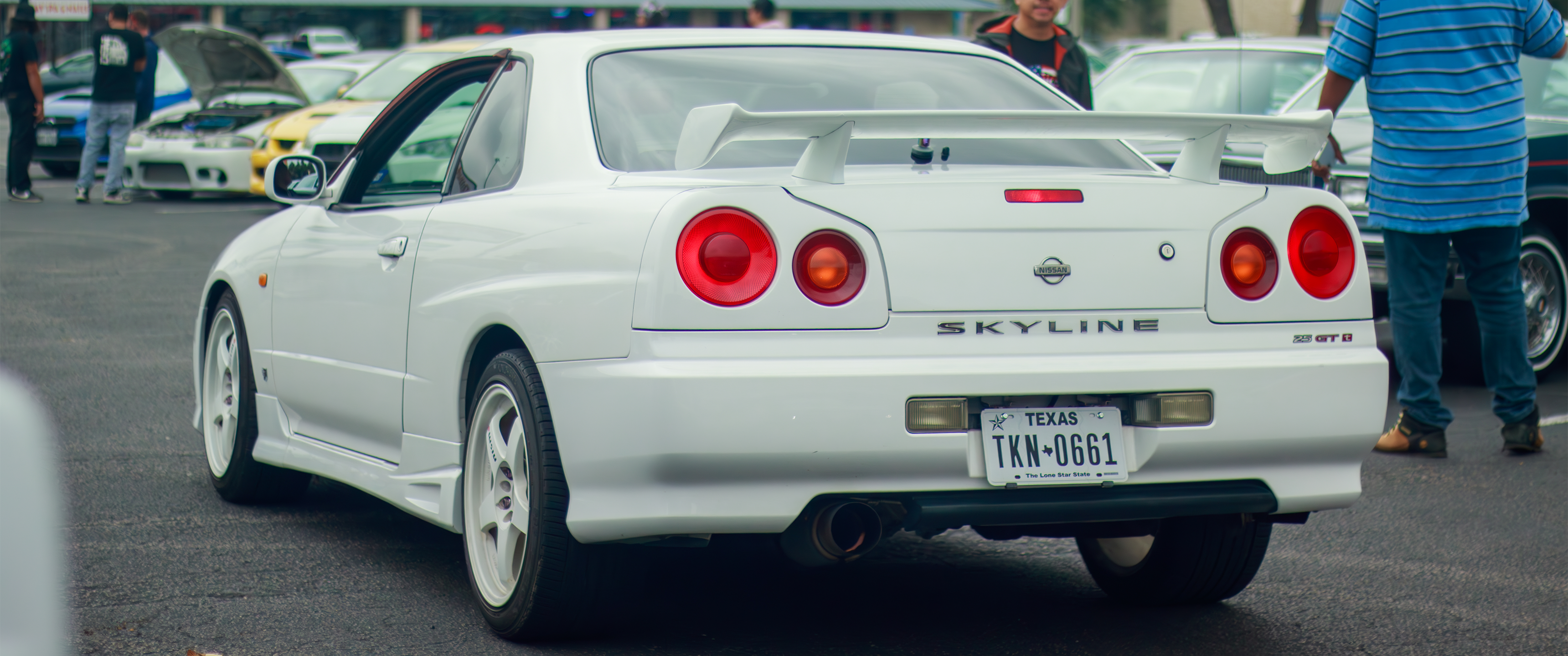 General 3440x1440 car Nissan Skyline R34 Nissan Skyline rear view licence plates vehicle people white cars