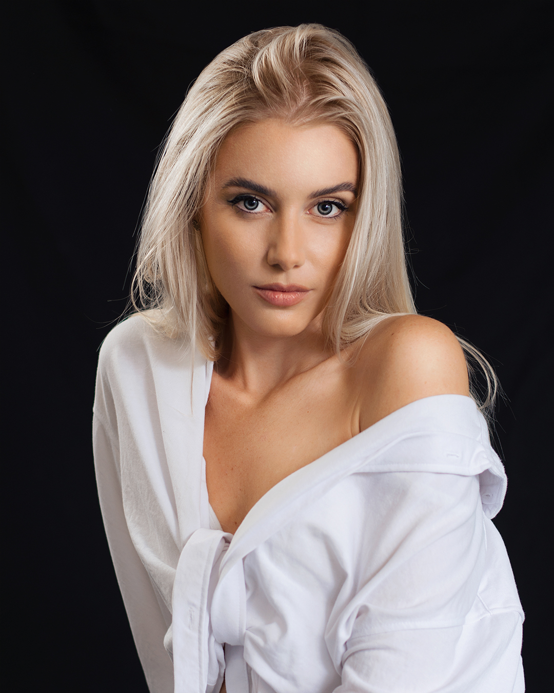 People 1080x1350 Jozef Kiss women blonde blue eyes eyeliner bare shoulders white clothing simple background portrait Chiara Juhos