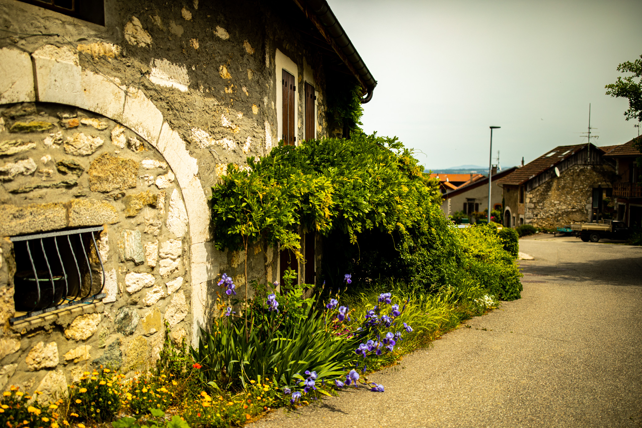 General 2048x1365 outdoors photography building house village flowers greenery nature stones road